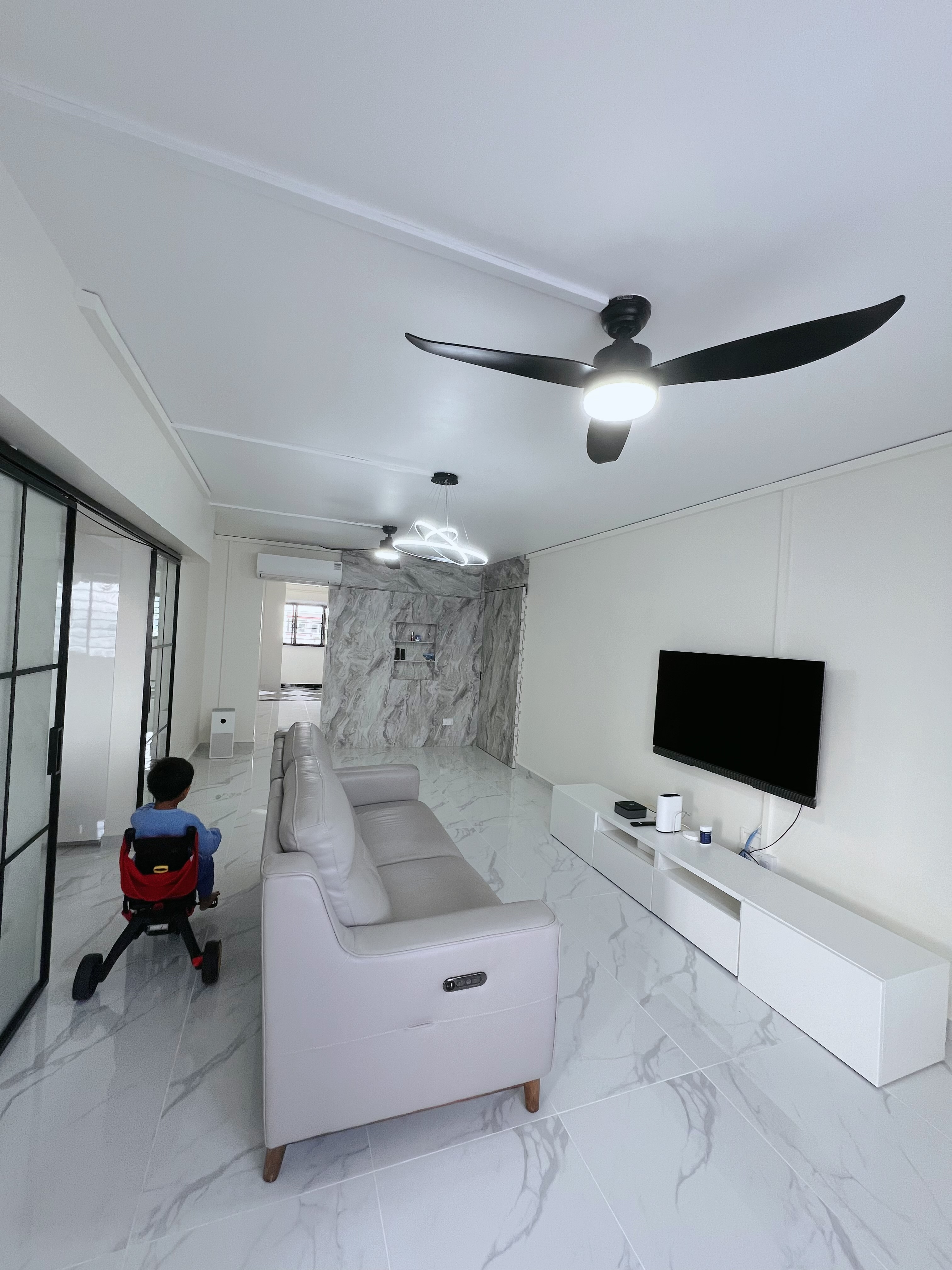 Living Room: Blending cherished furnitures with ample open space  - Modern minimalist living room with sleek design, spacious