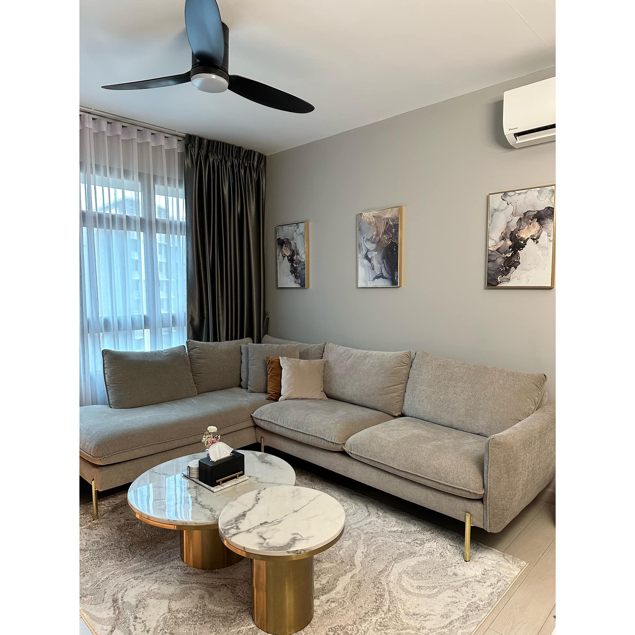 Creating A Modern-luxe Living Room Through Perfect Furniture Pairing - Modern living room with gray sofa, marble coffee