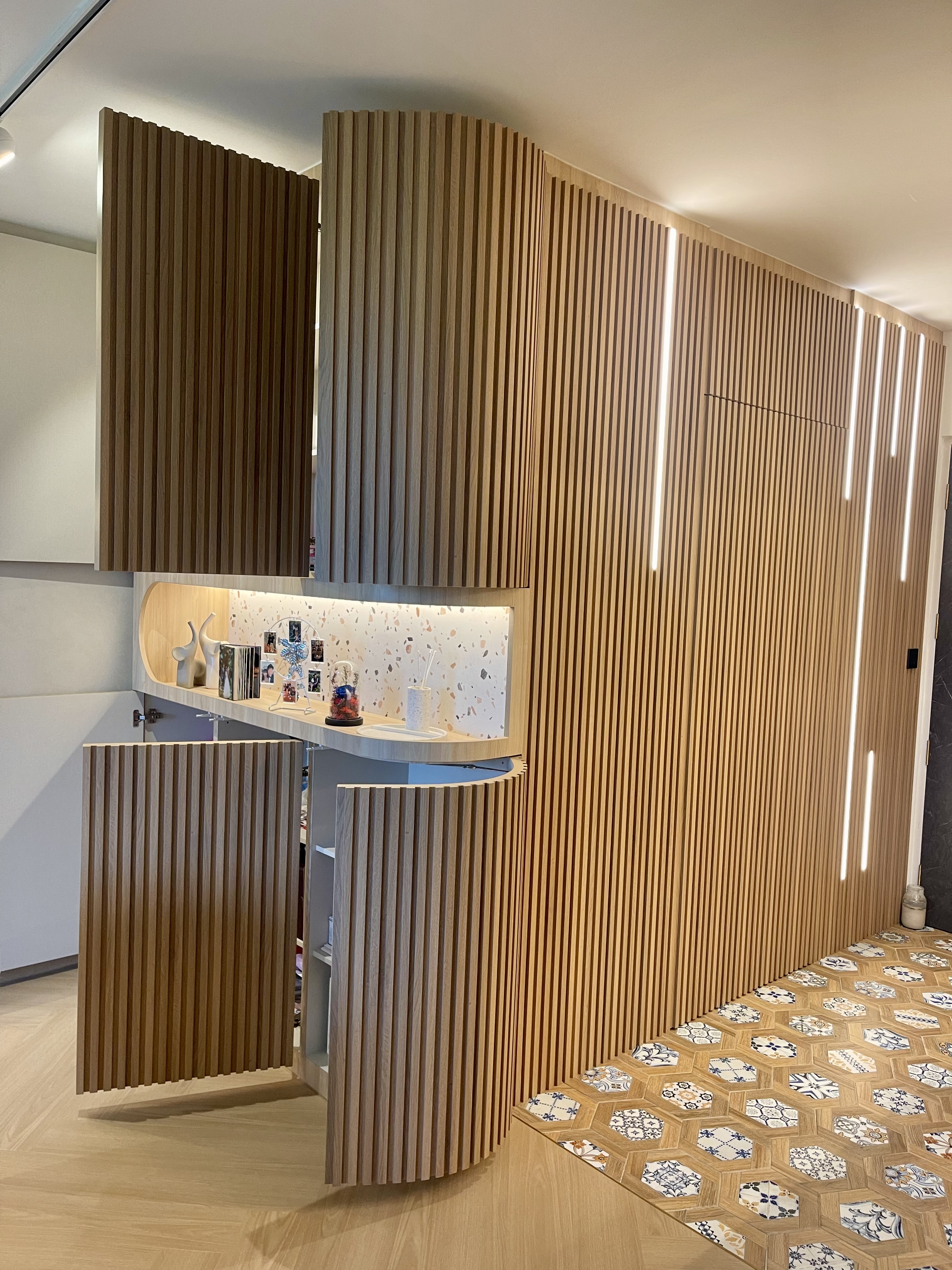 Our Japandi Lounge: A Blend Of Limewash Walls And Curved Fluted Panels - Wooden panel wall, hexagonal tile floor, modern