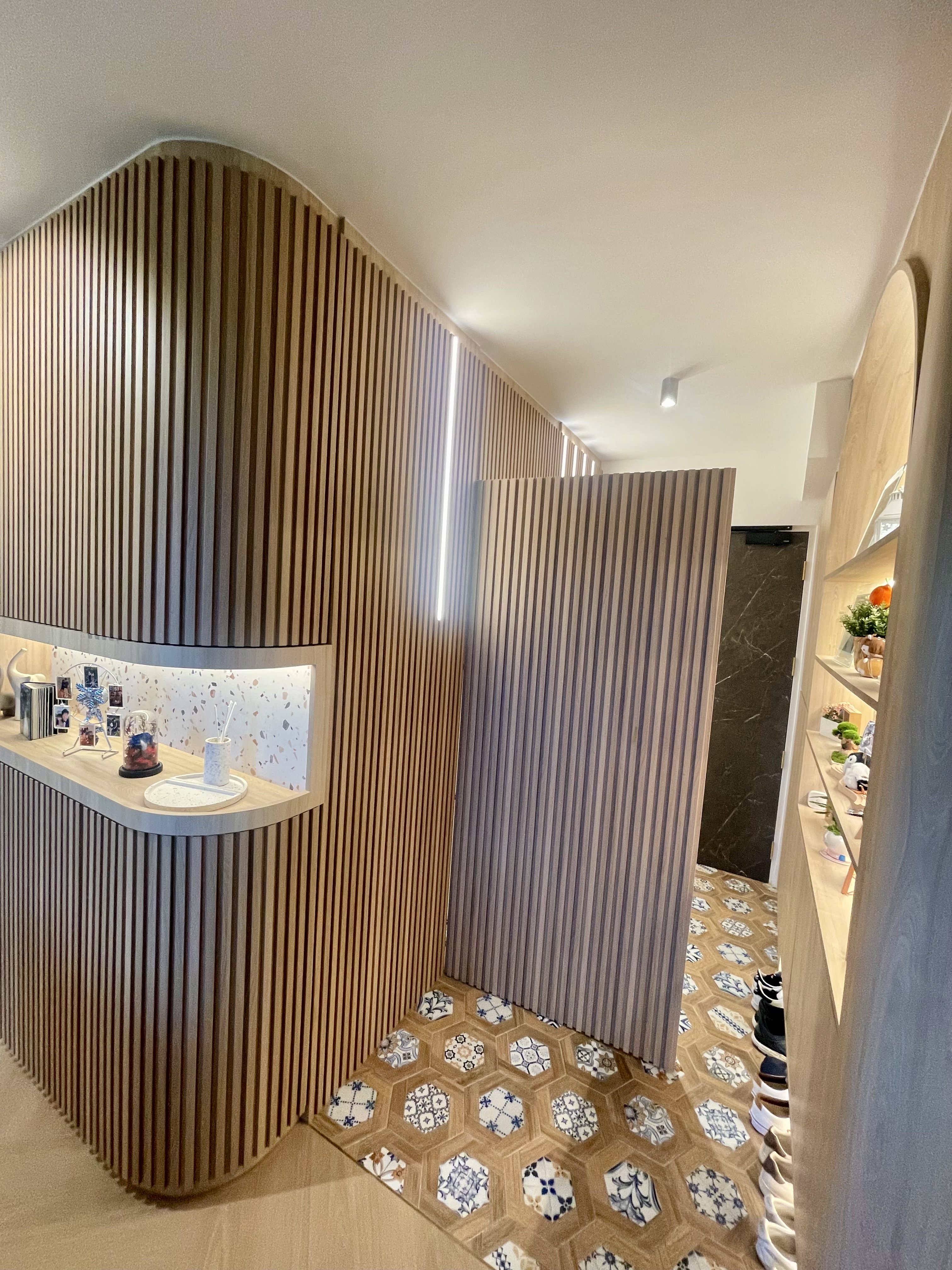 Our Japandi Lounge: A Blend Of Limewash Walls And Curved Fluted Panels - Wooden panel wall, vertical slats, modern design