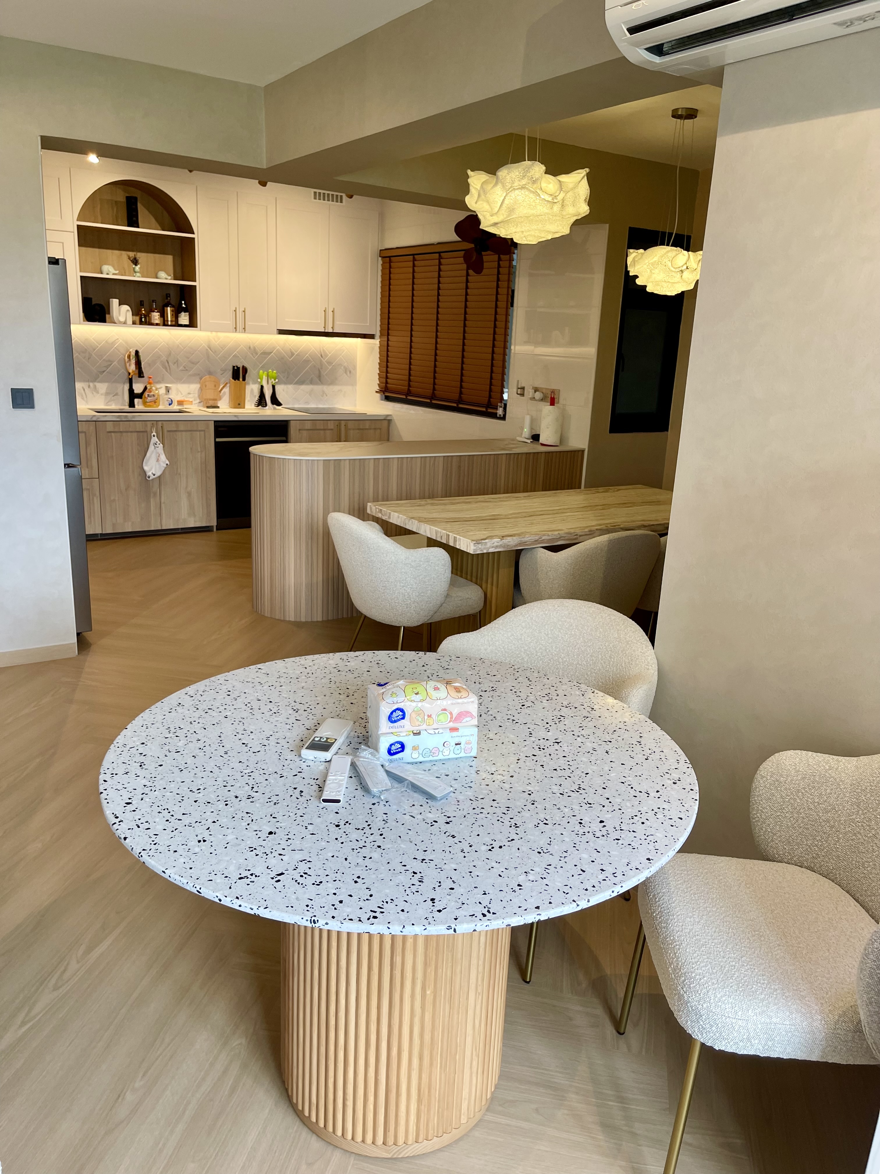 Our Japandi Lounge: A Blend Of Limewash Walls And Curved Fluted Panels - Modern kitchen with wooden cabinets, white