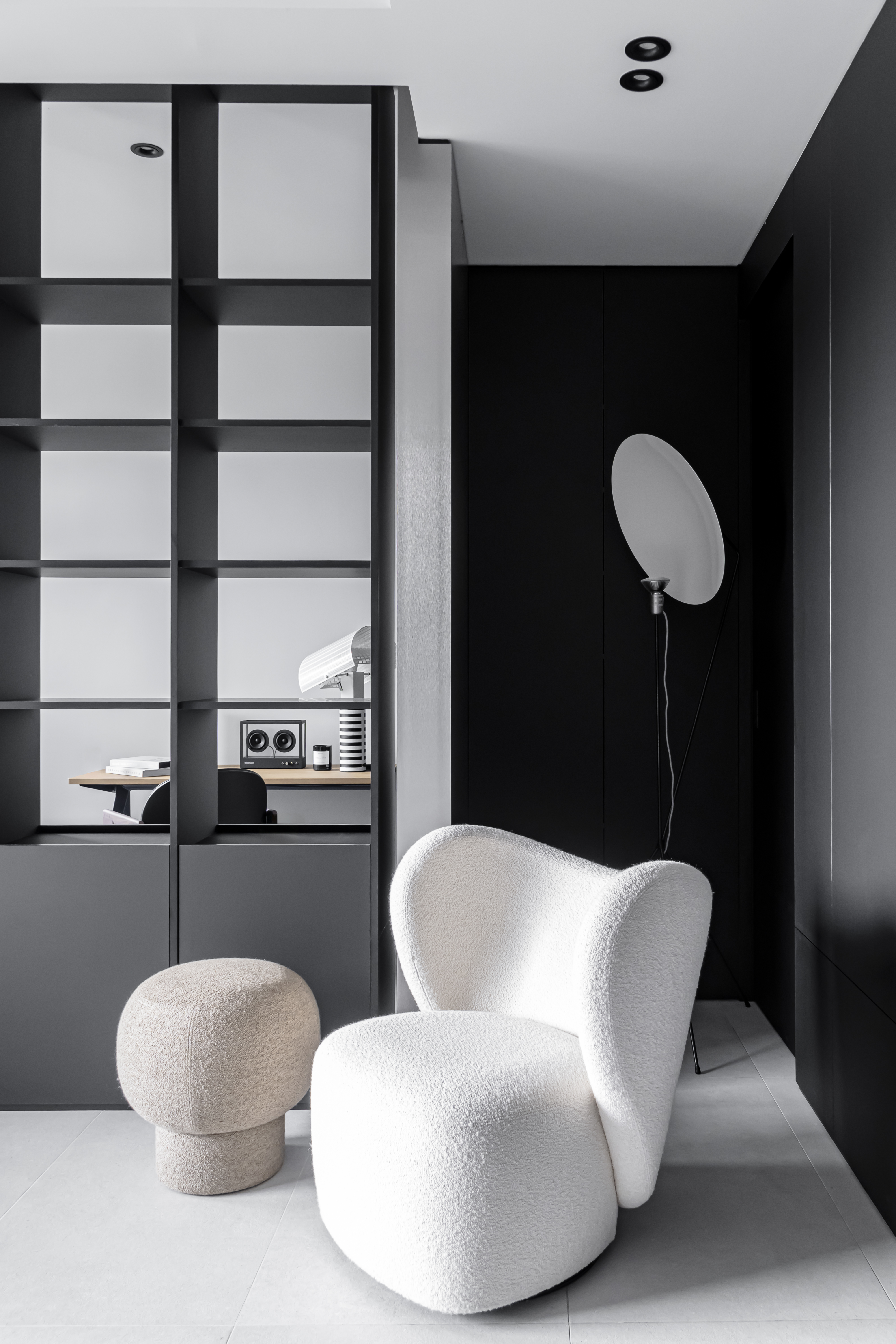 Our Living Room: A Gallery of Designer Pieces  - Modern minimalist office space, sleek shelving unit, black and white color