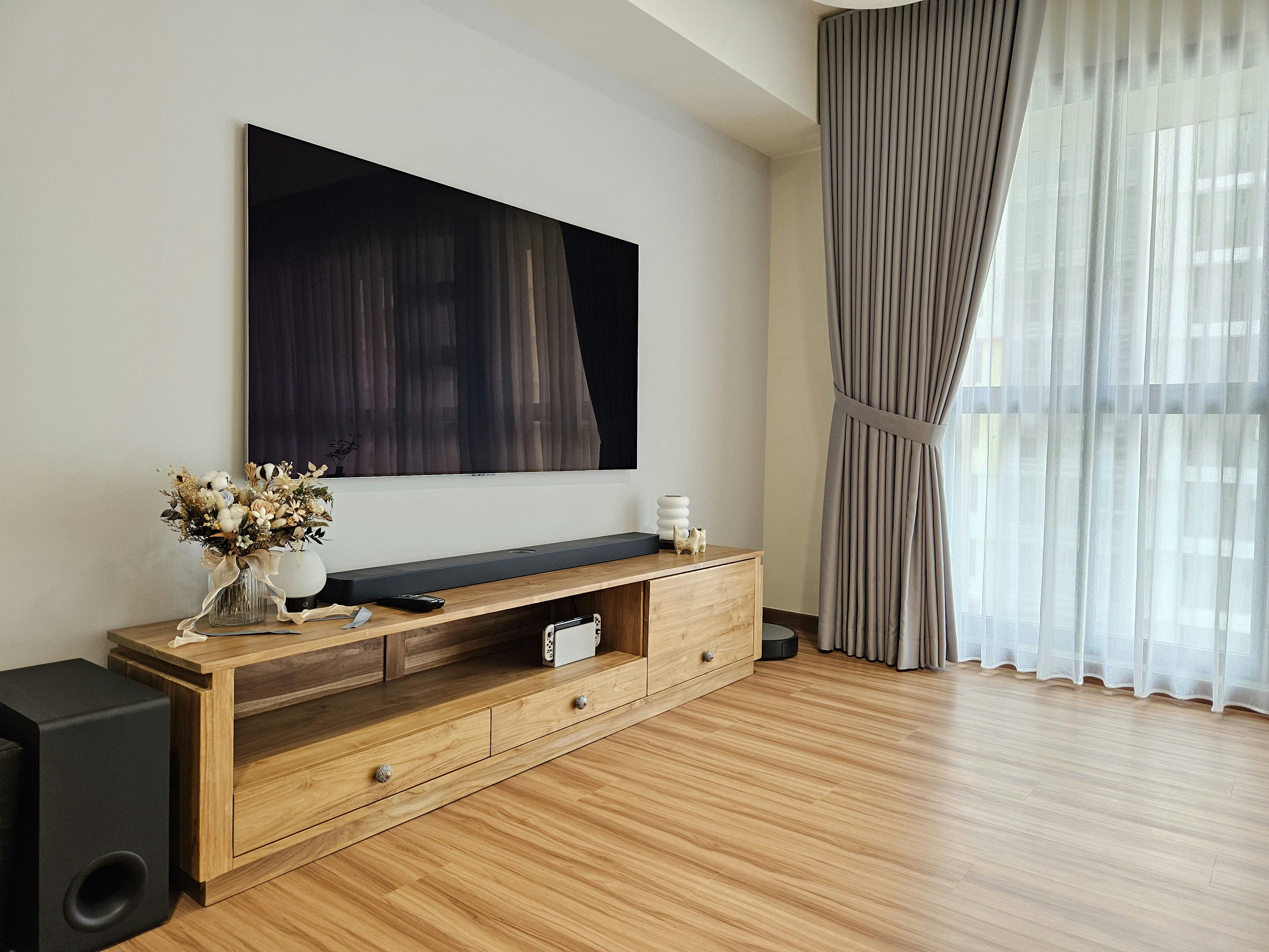 Maximising Space In Our 5m Long Living Room - Modern living room, minimalist decor, large flat-screen TV, wooden console