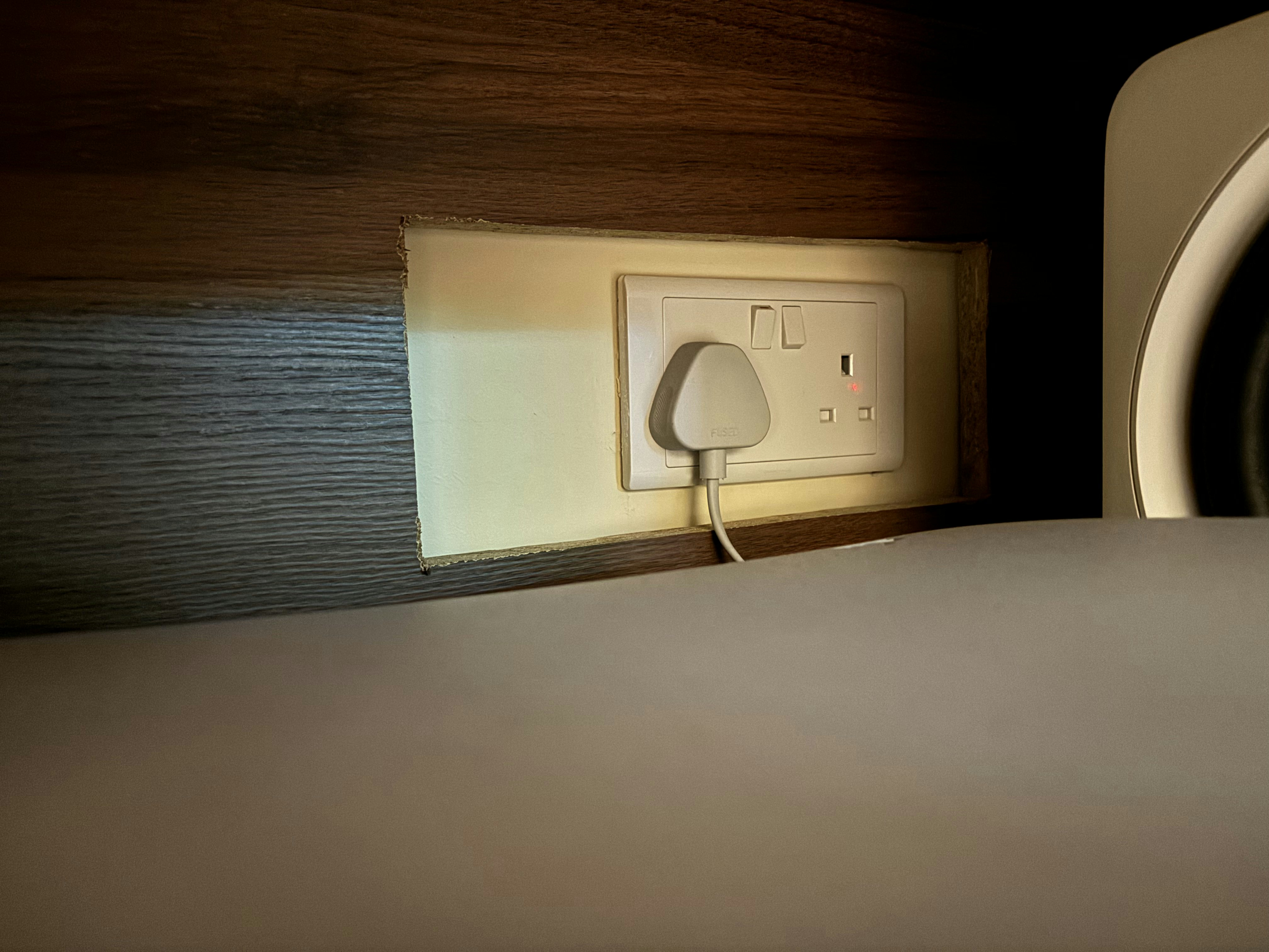 Our living room budget hack: "built in" TV console for just $250 - Wall socket, power outlet, electrical plug, light switch