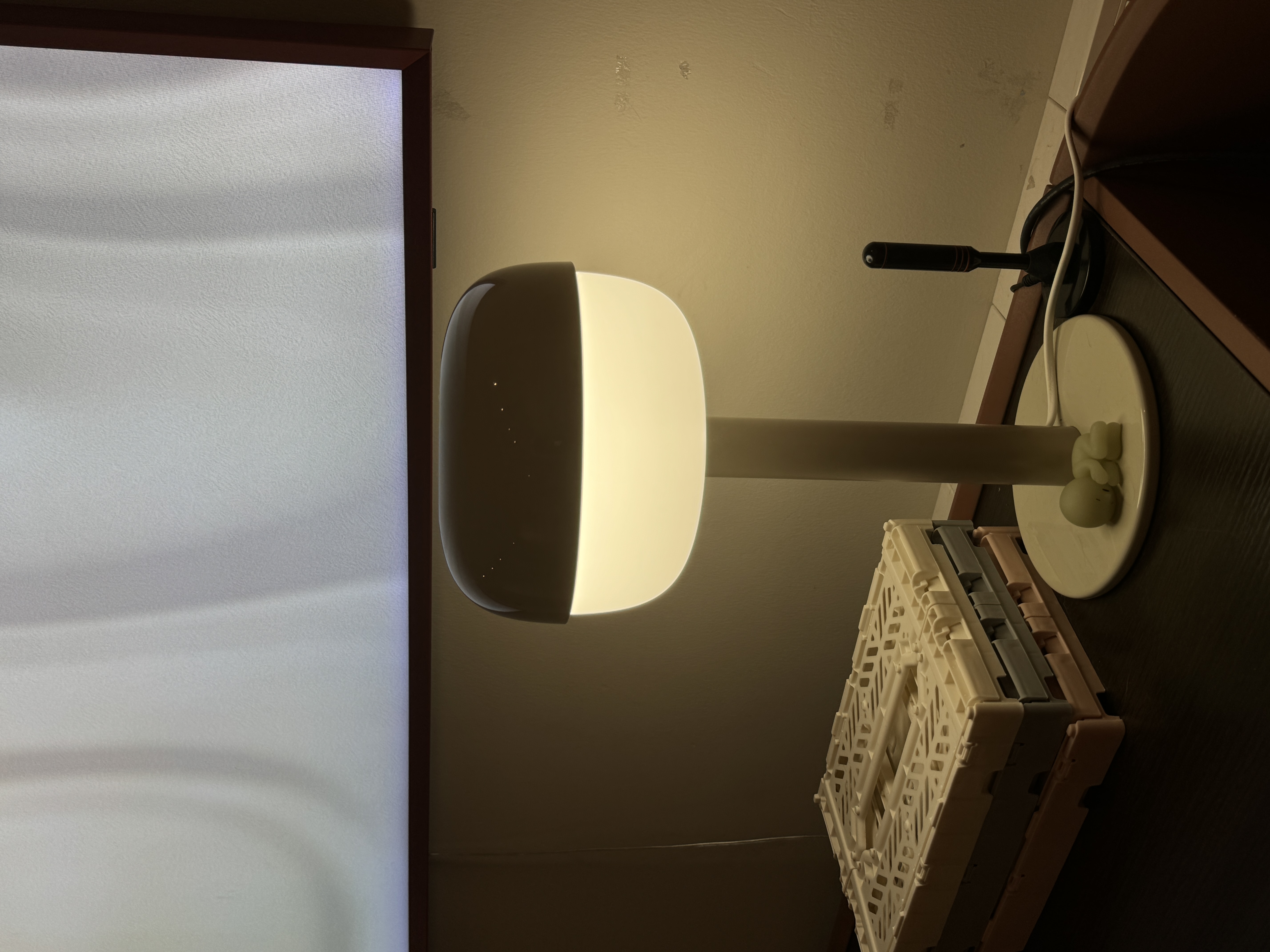 Lighting Tips: Creating Warmth and Style with Lighting - Lamp with soft light, minimalist design, wall-mounted, warm