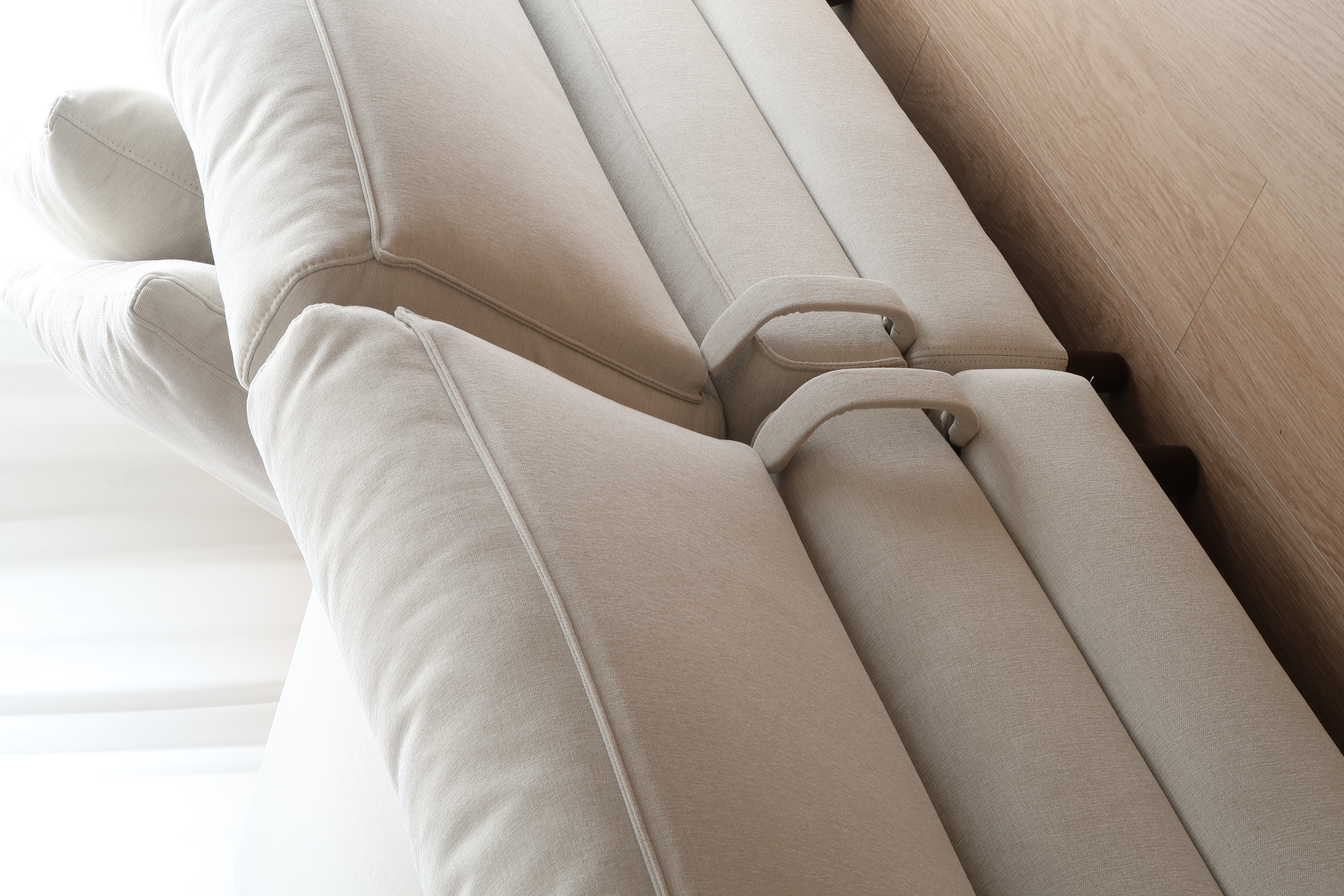 Living Room: Where the Homebodies Gather - Cream-colored, modern, plush, cushioned, recliner, minimalist, cozy, soft