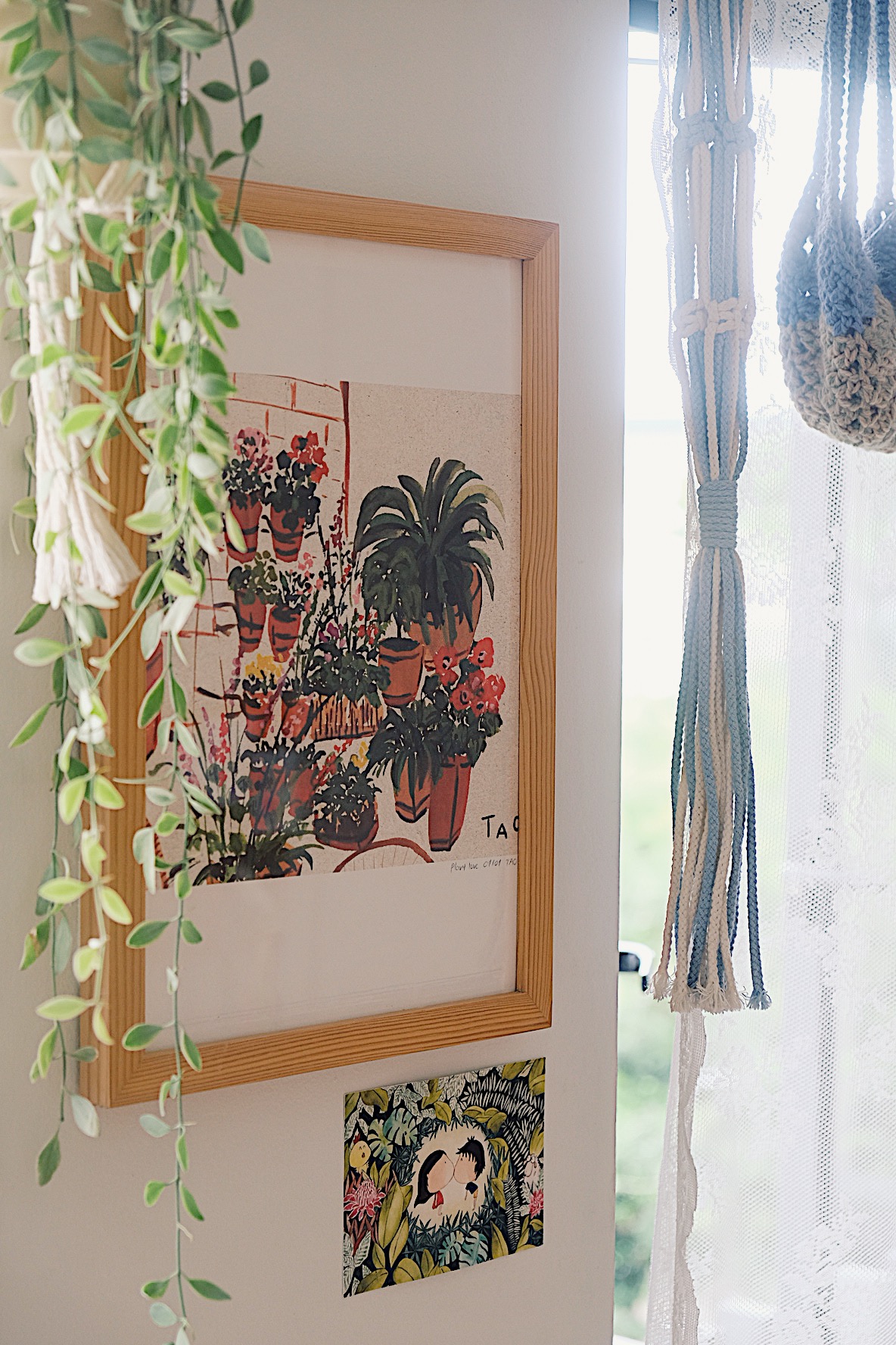 Styling gallery walls filled with memories in our Living Room (+TIPS) - vibrant botanical artwork, hanging plant, natural