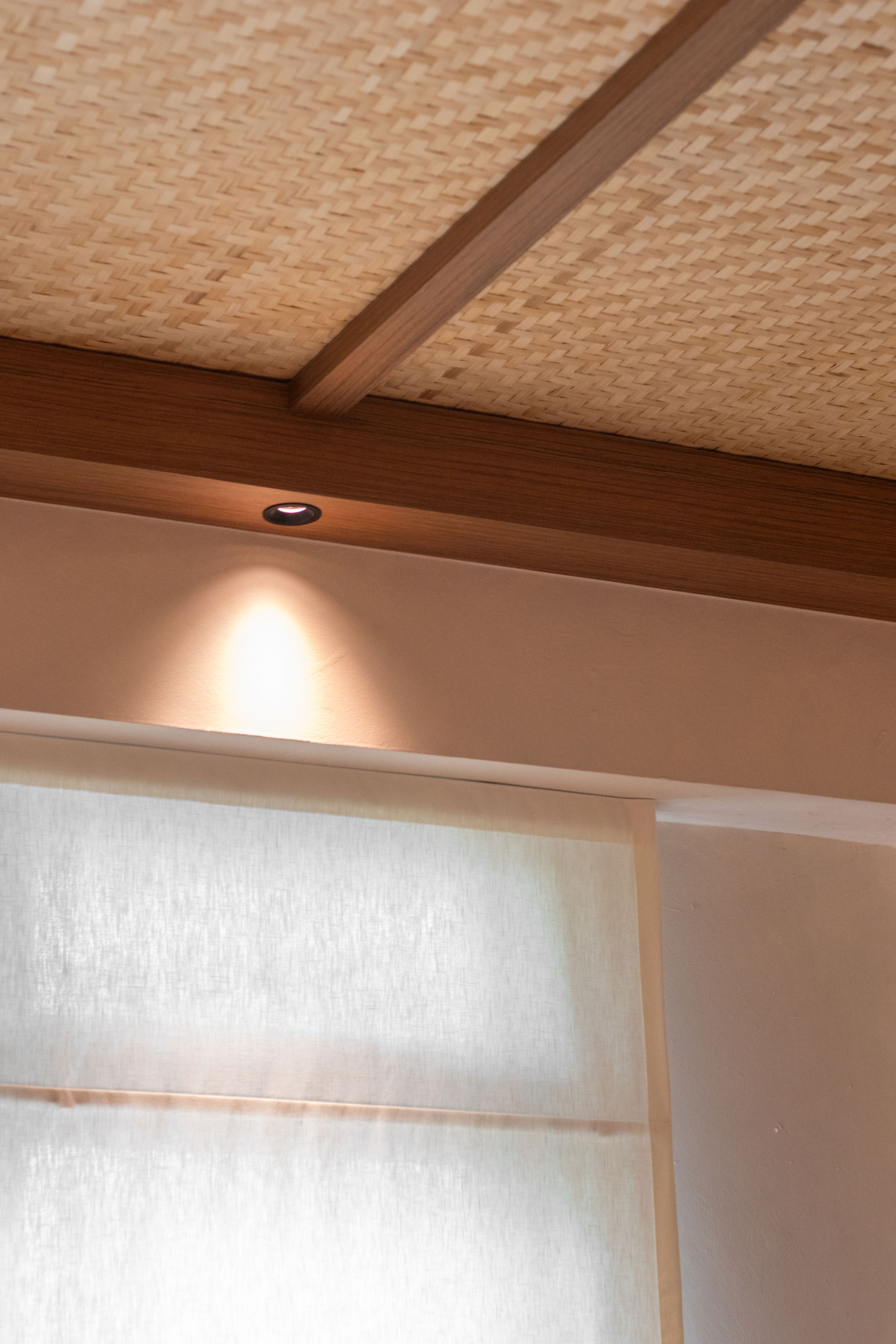 How we achieved our dream cosy living room - through art and warmth - Woven ceiling, wooden beams, soft lighting, textured