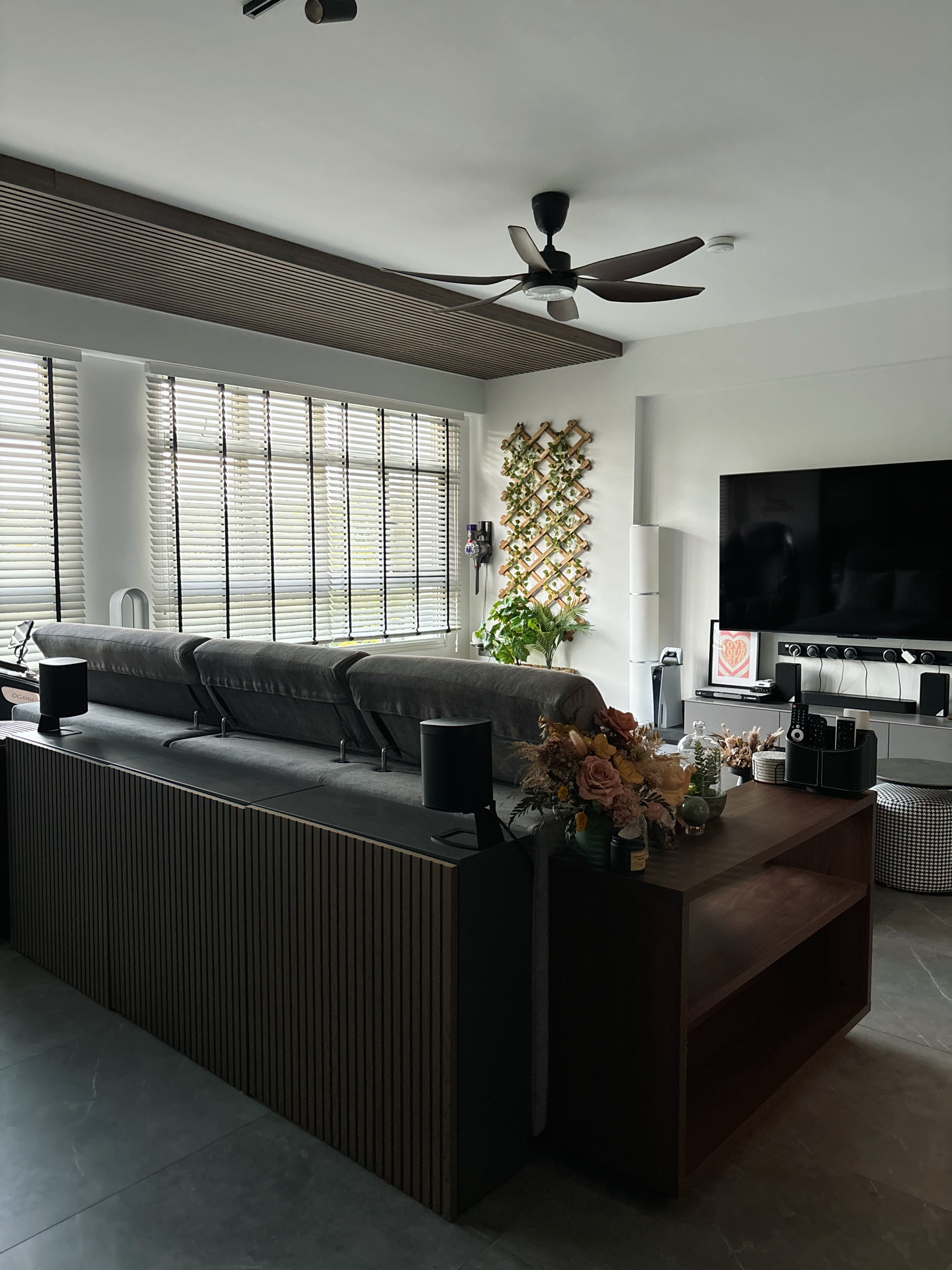 Minimal Effort, Maximum Comfort: Welcome to Our Living Room - Modern living room with sleek design, large window with blinds