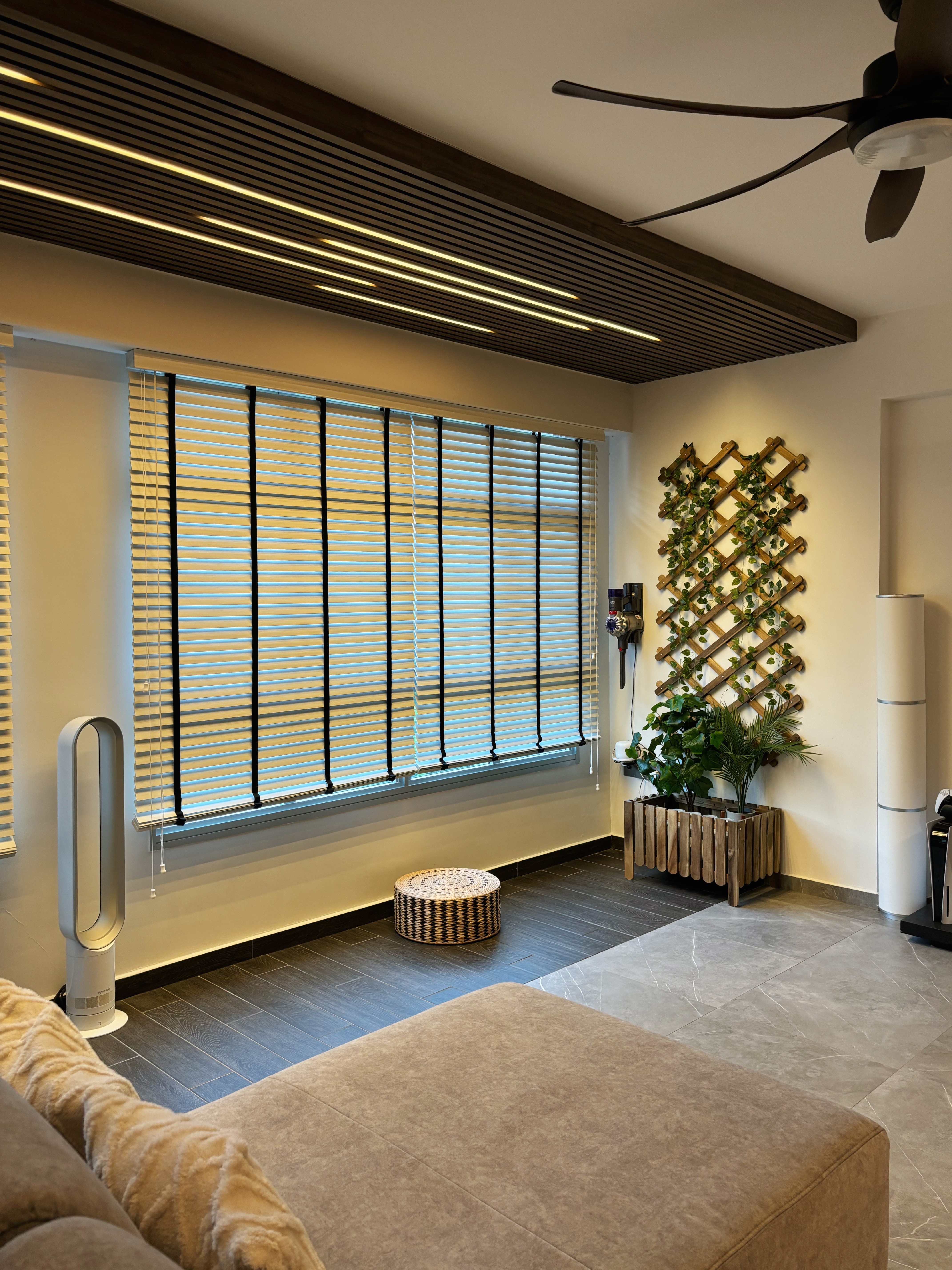 Minimal Effort, Maximum Comfort: Welcome to Our Living Room - Modern living room with large window, wooden blinds, ceiling