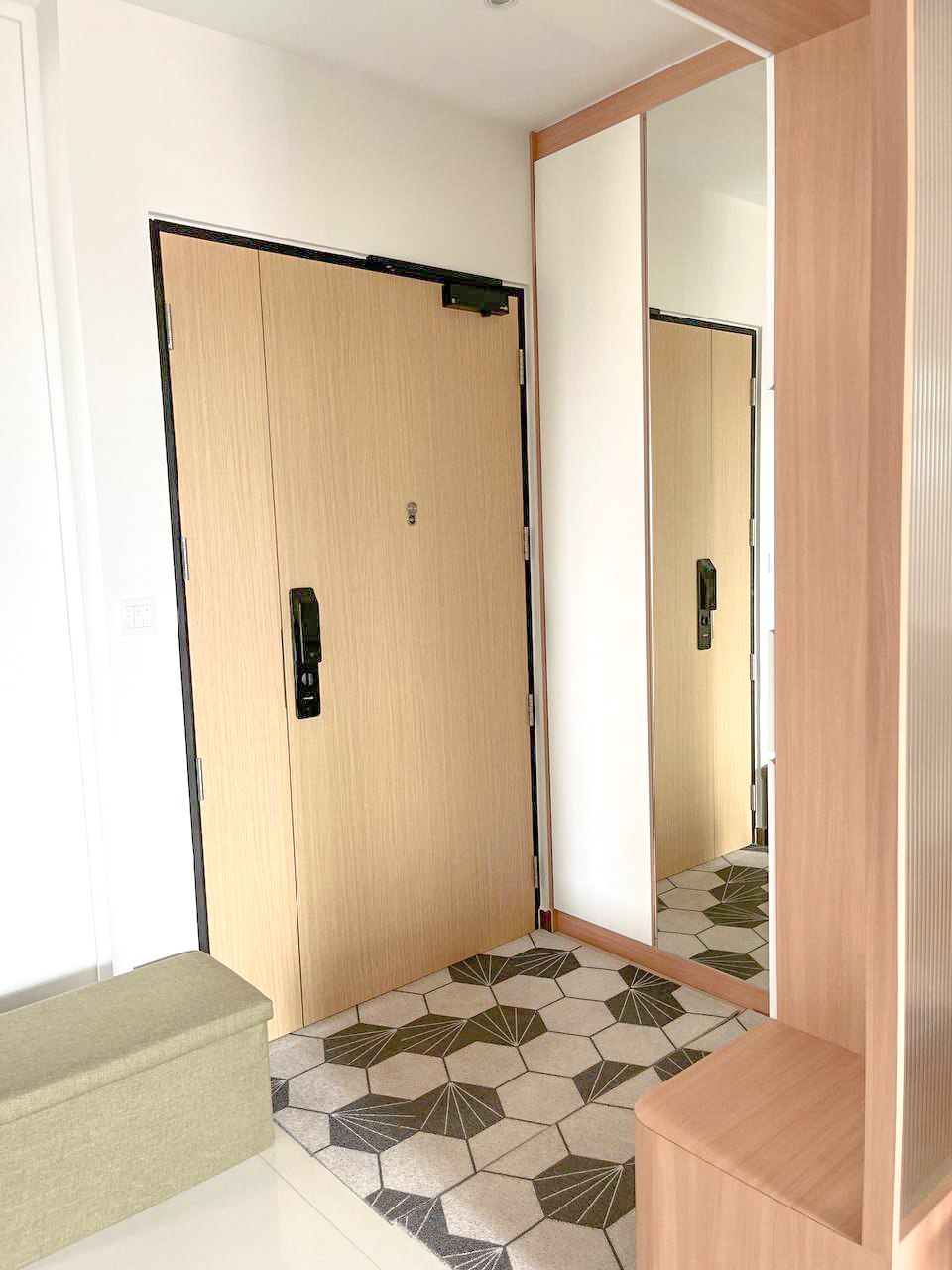 Japandi-inspired entry way with fully functional storage space area  - Wooden wardrobe doors, mirrored closet doors