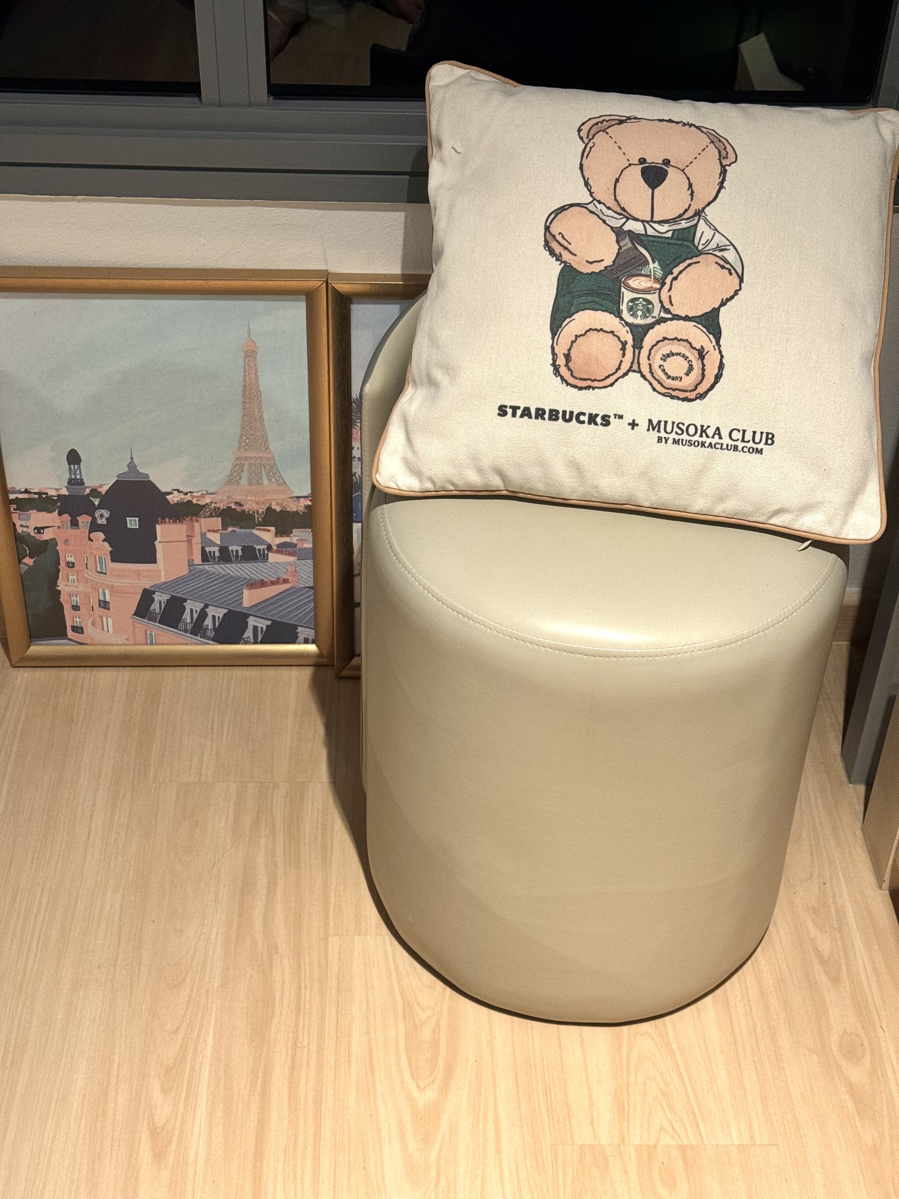 Favourite Spots for the Weekend Homies - Comfortable seating with a stylish pillow featuring a teddy bear illustration.