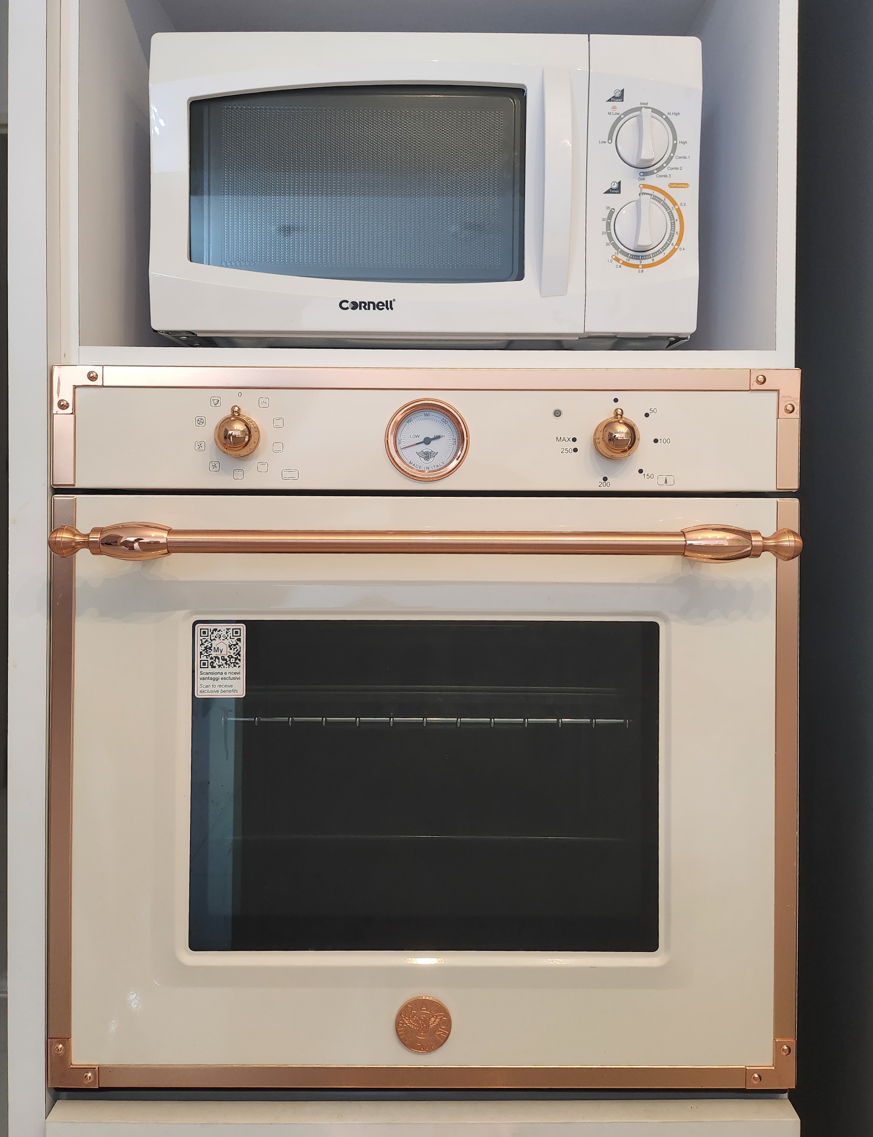 Best home investment(s) by PunggoHField - White microwave with control panel, copper knobs, "Cornell" brand, control panel