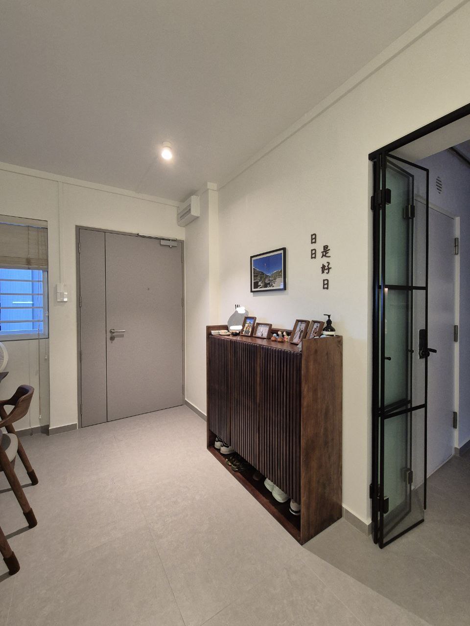 Sunset hues along our Entryway... a space for us to keep growing into - Modern minimalist office space, sleek wooden console