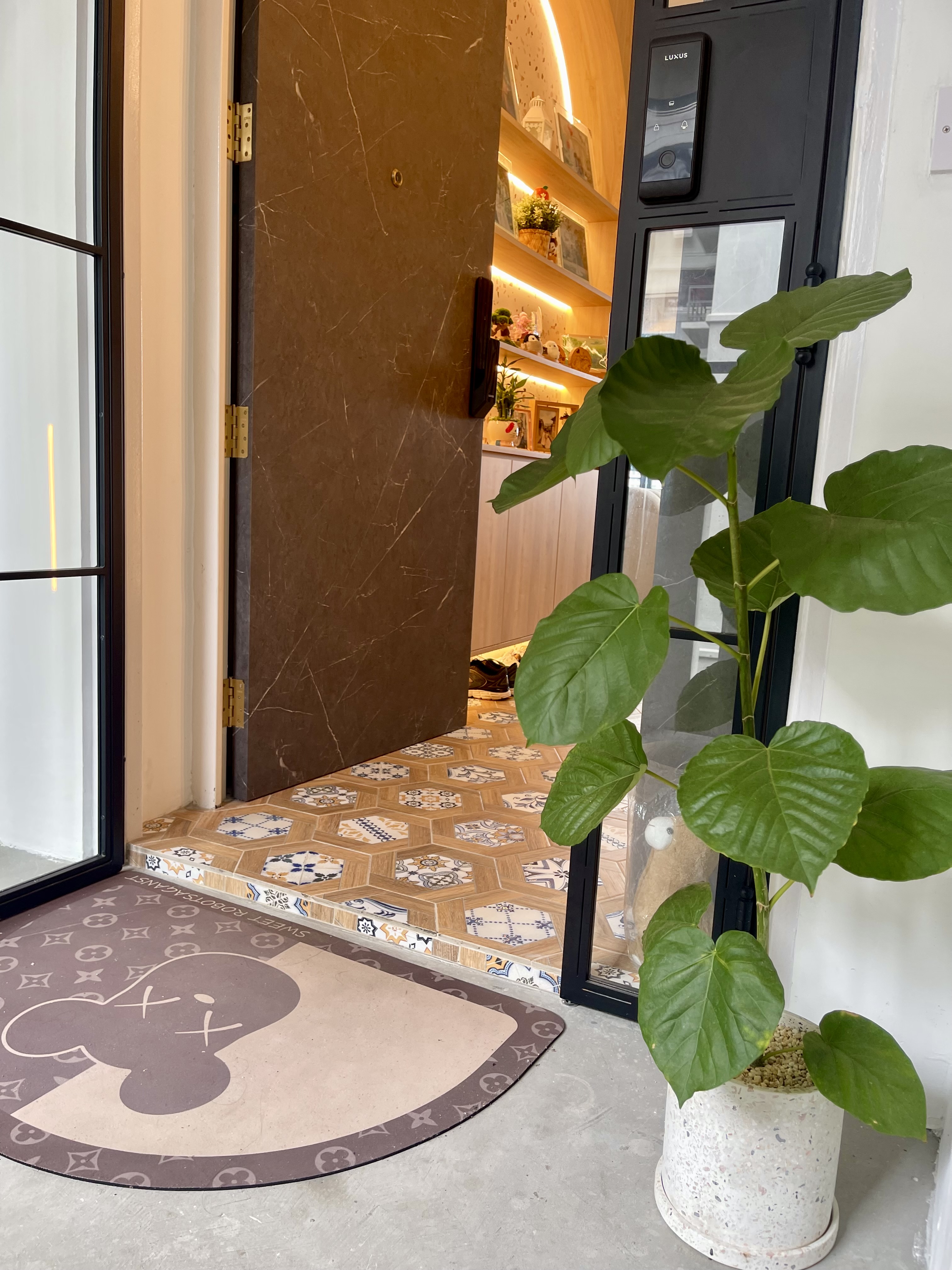 Our Entryway: An Amalgamation Of Peranakan Tiles & Tempered Glass Gate - Glass door, indoor plant, tiled floor, patterned
