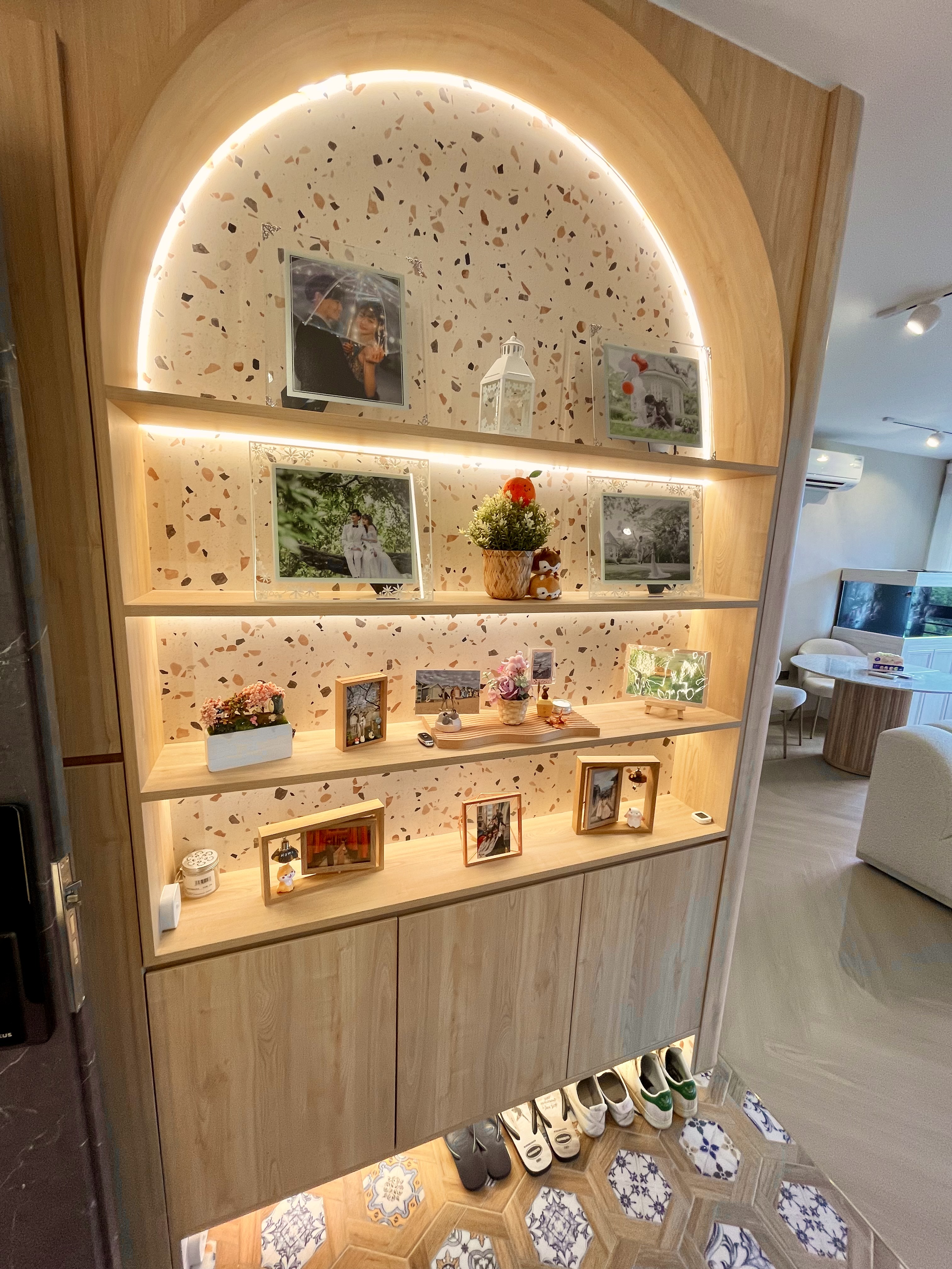 Our Entryway: An Amalgamation Of Peranakan Tiles & Tempered Glass Gate - Wooden shelf, decorative display, framed photos