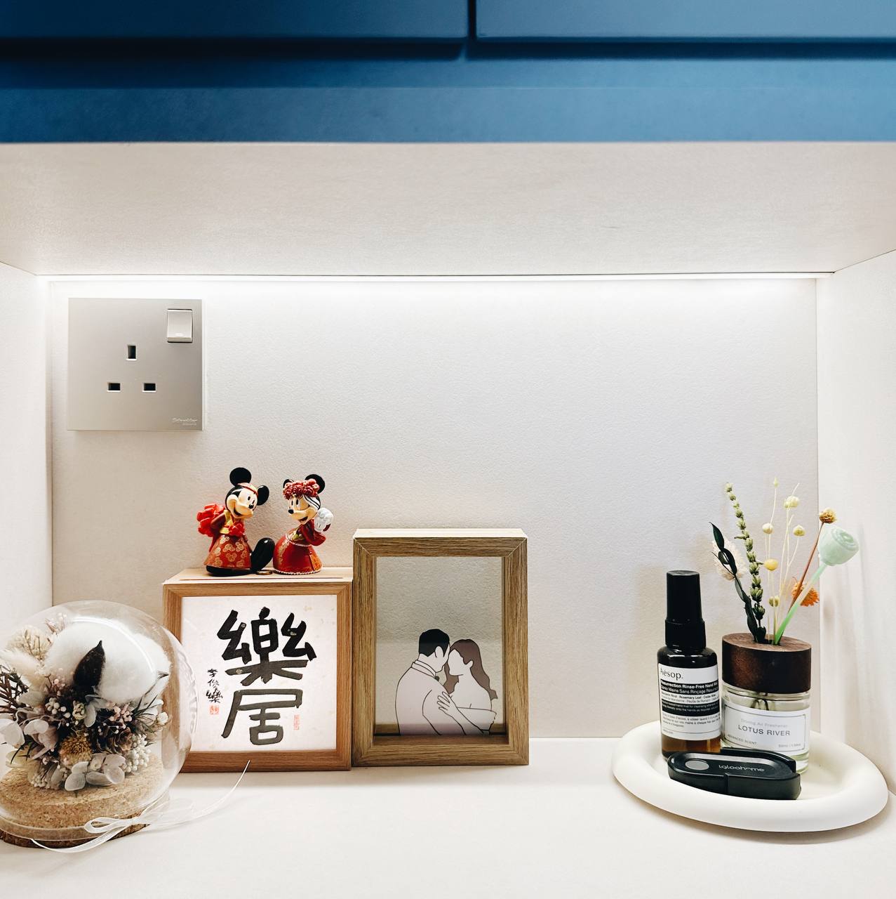 Our Entryway: Built-in shoe cabinet or not?  - couple figurine, decorative items, red and gold attire, Mickey Mouse figurine