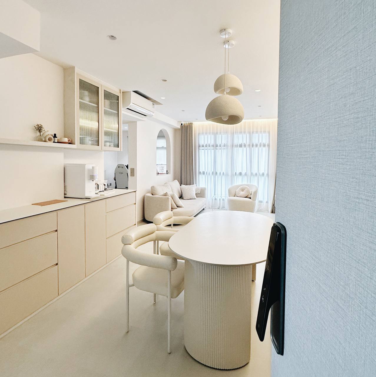 Our Entryway: Built-in shoe cabinet or not?  - Modern minimalist kitchen with white cabinetry, sleek appliances, and a