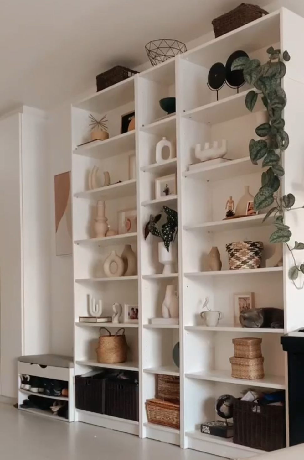 Our Entryway: Creating A Functional And Aesthetic Space With DIY  - White shelving unit, minimalist design, decorative items