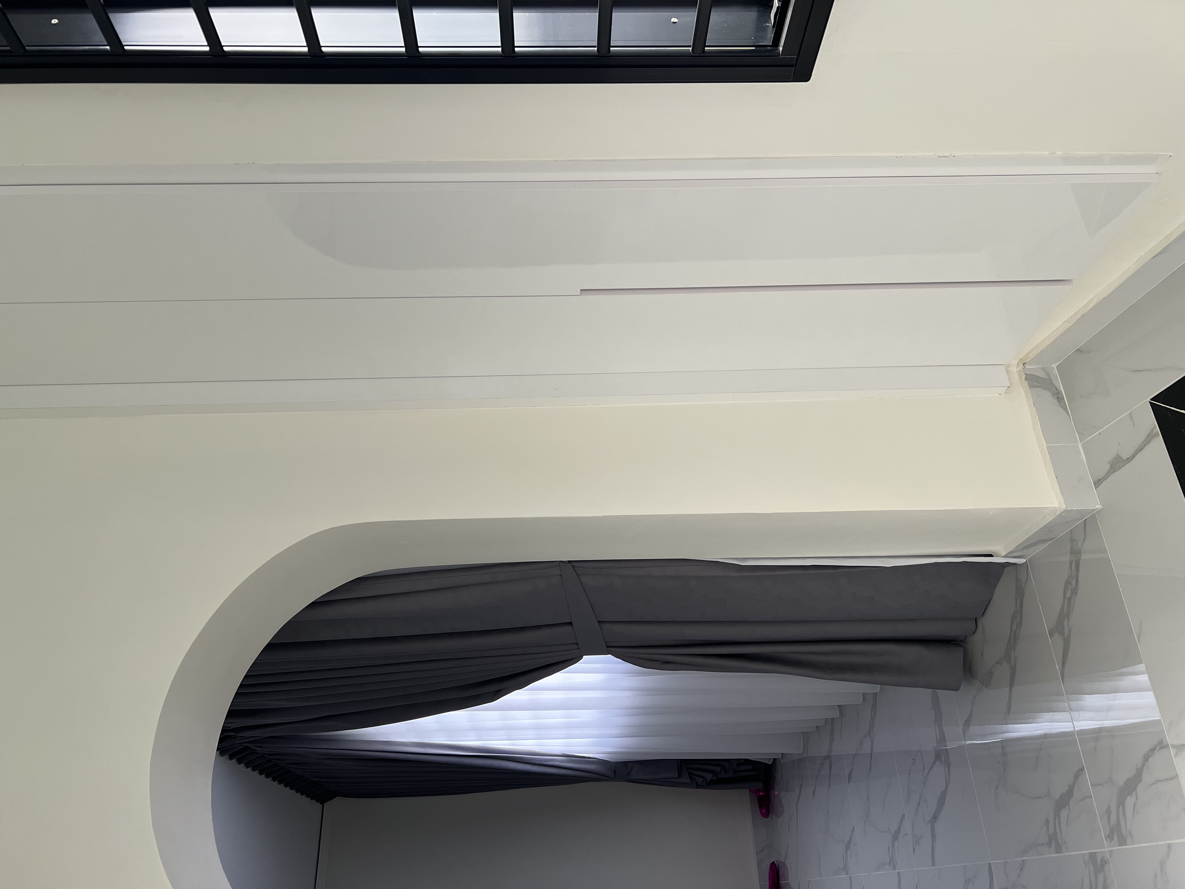 Entryway Evolution: From Hiccups to Highlights - Modern minimalist interior, white ceiling, sleek design, geometric shapes