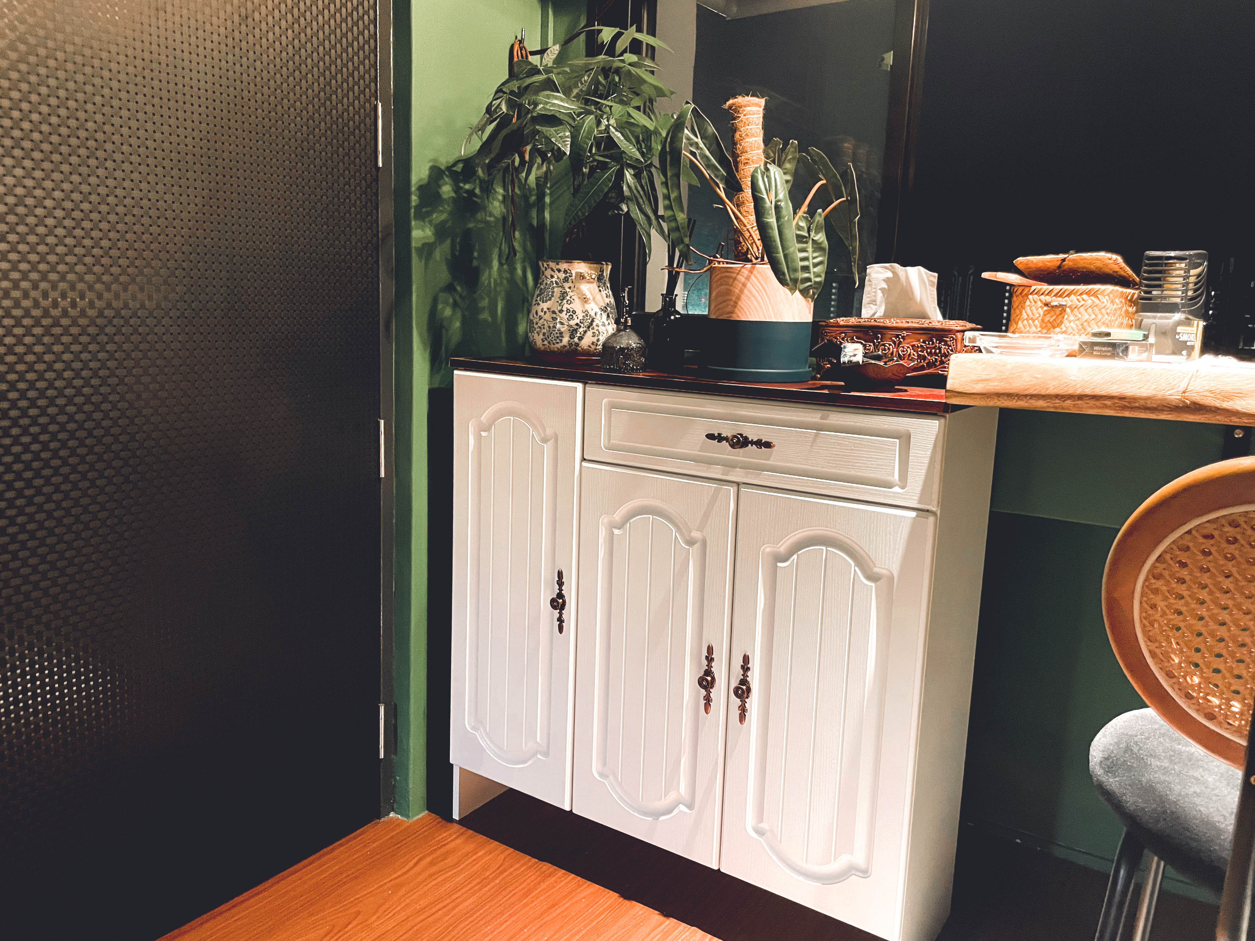 Entryway Meets DIY Balcony: Our Personalized Welcome Space - White cabinet with ornate handles, green wall, wooden floor