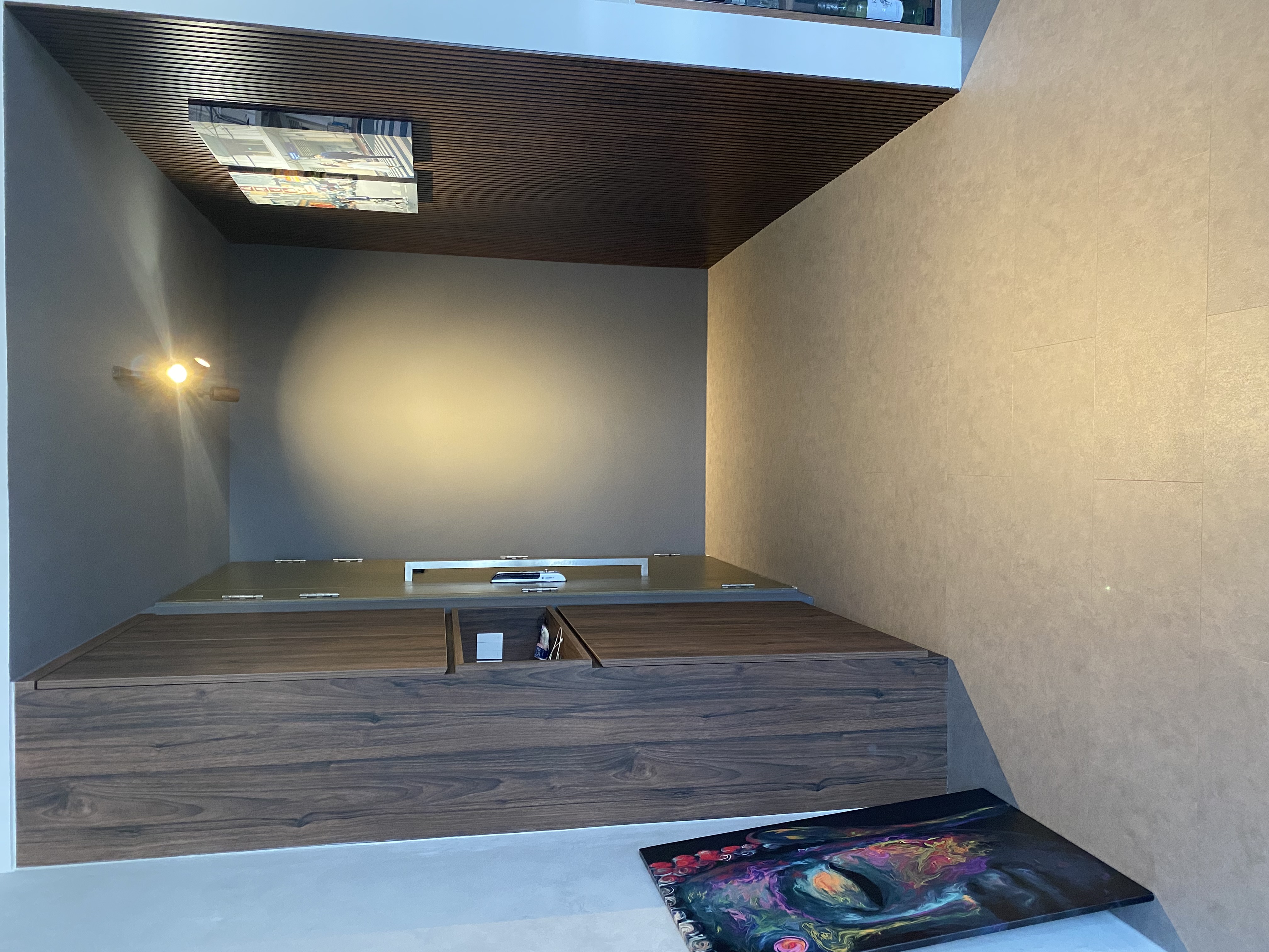 Gallery style entryway with dark wood fluted panel - modern minimalist interior, sleek wooden ceiling, geometric design