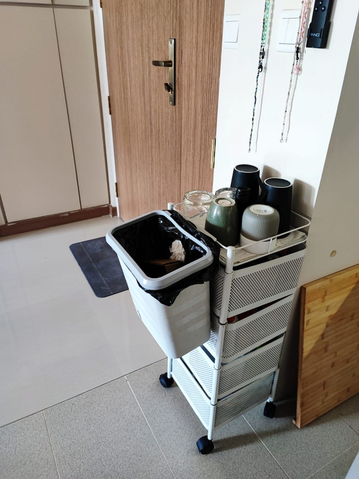 A functional entryway - Using paint to conceal unsightly areas! - doorway, kitchen, trash can, recycling bin, kitchen