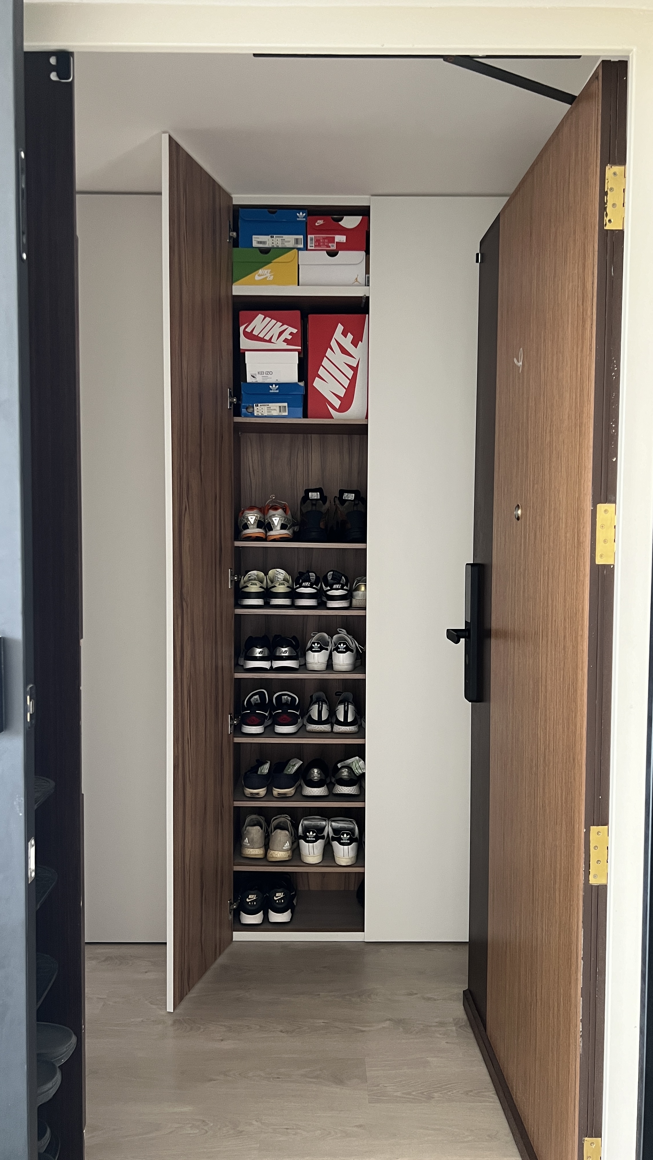 Mini Entryway.. with a Full-Height Shoe Cabinet?! 😱 - Shoe closet with neatly organized sneakers, wooden shelves, Nike and