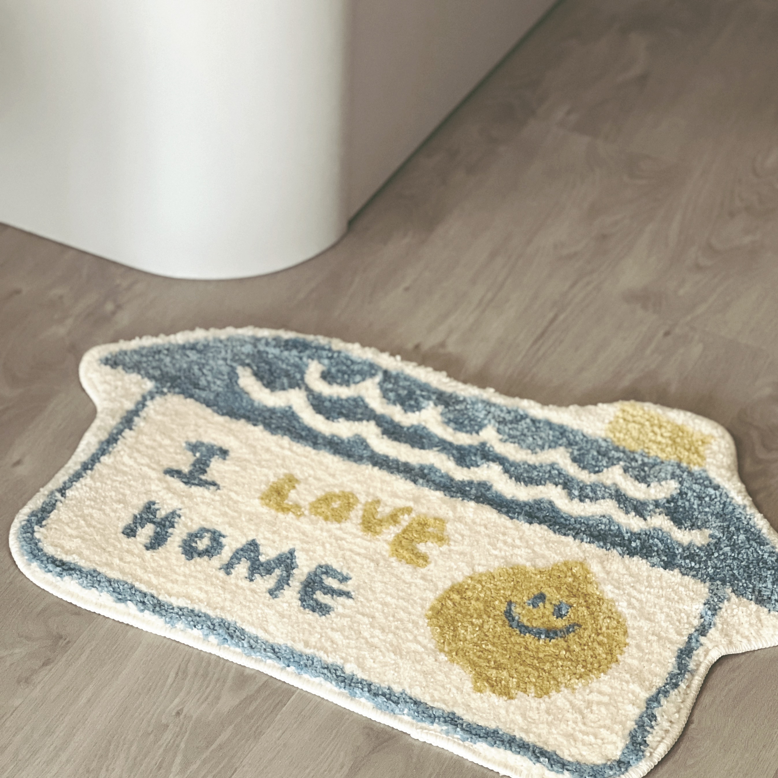 Mini Entryway.. with a Full-Height Shoe Cabinet?! 😱 - Soft, beige doormat with blue and yellow wave patterns, featuring the