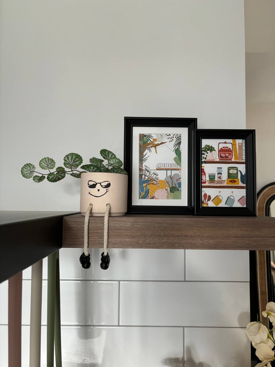 Hidden in plain sight - can you spot the hidden elements in our home? - mossy plant, beige pot, black rope, abstract art