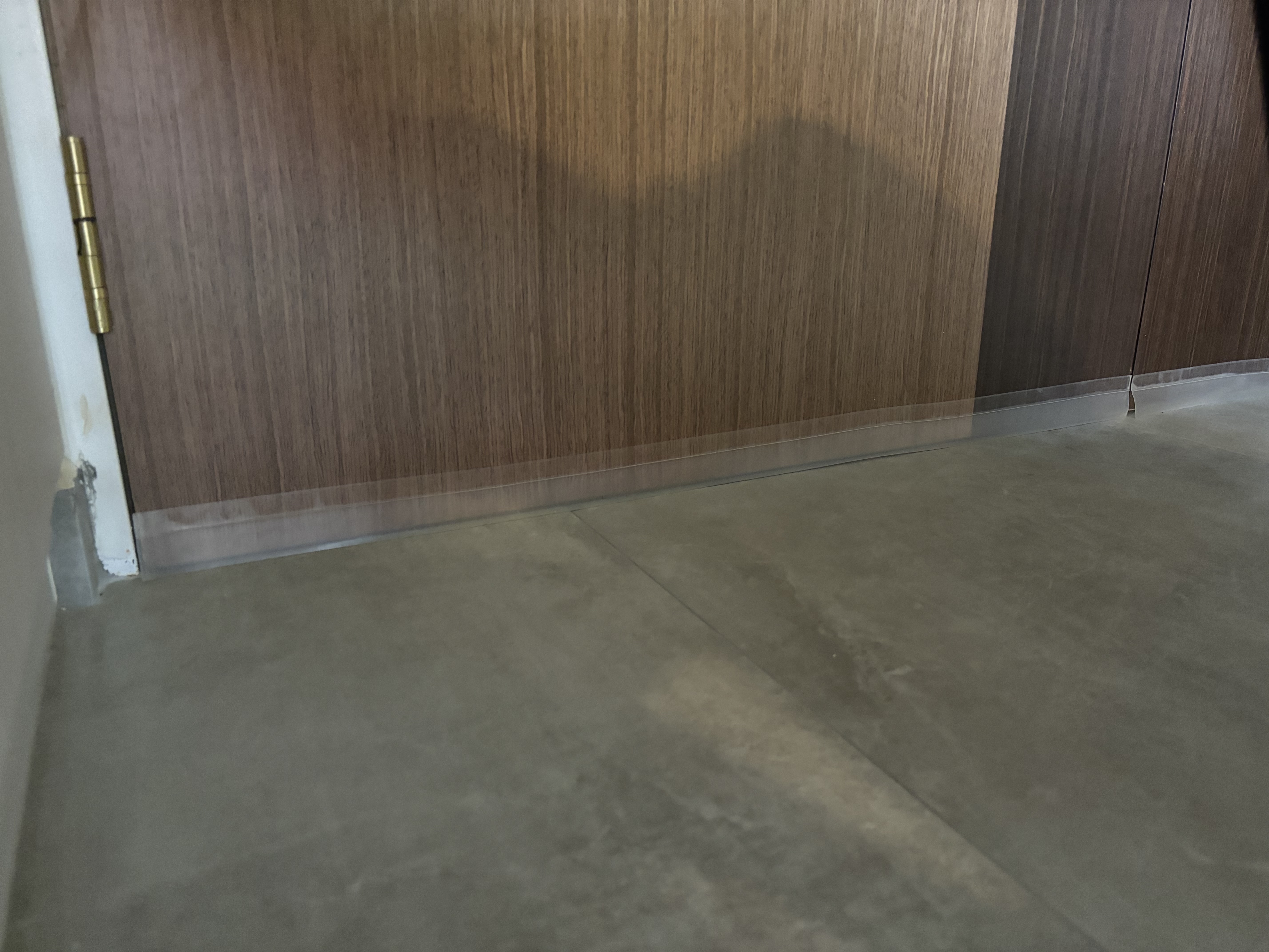 3-in-1 Security Mesh: Insect proof, child proof and cat proof  - Wooden panel, concrete floor, modern design, minimalist