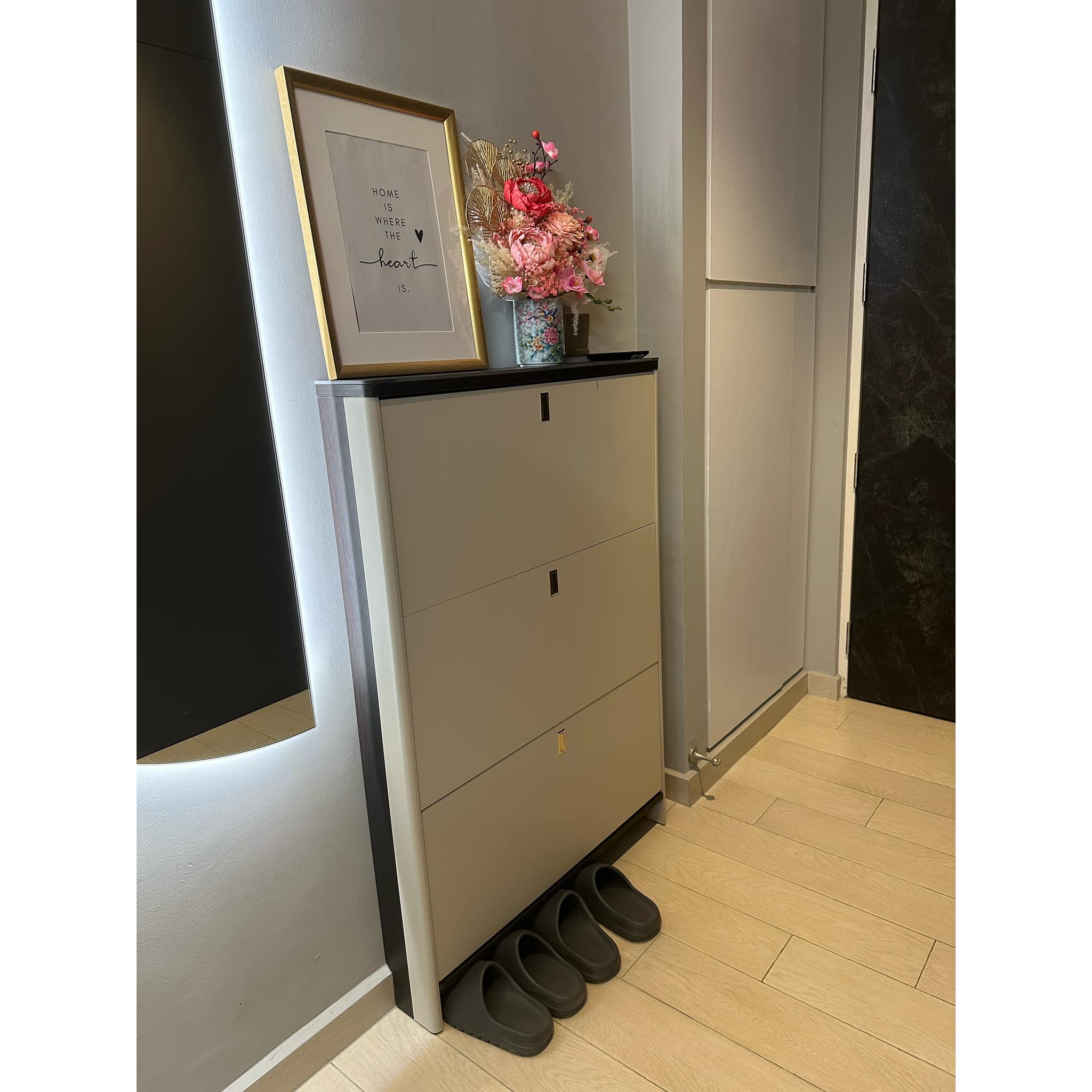 A Stylish Welcome: Sleek, Spacious and Shoe-Friendly - vintage vase, floral arrangement, pink flowers, decorative paper