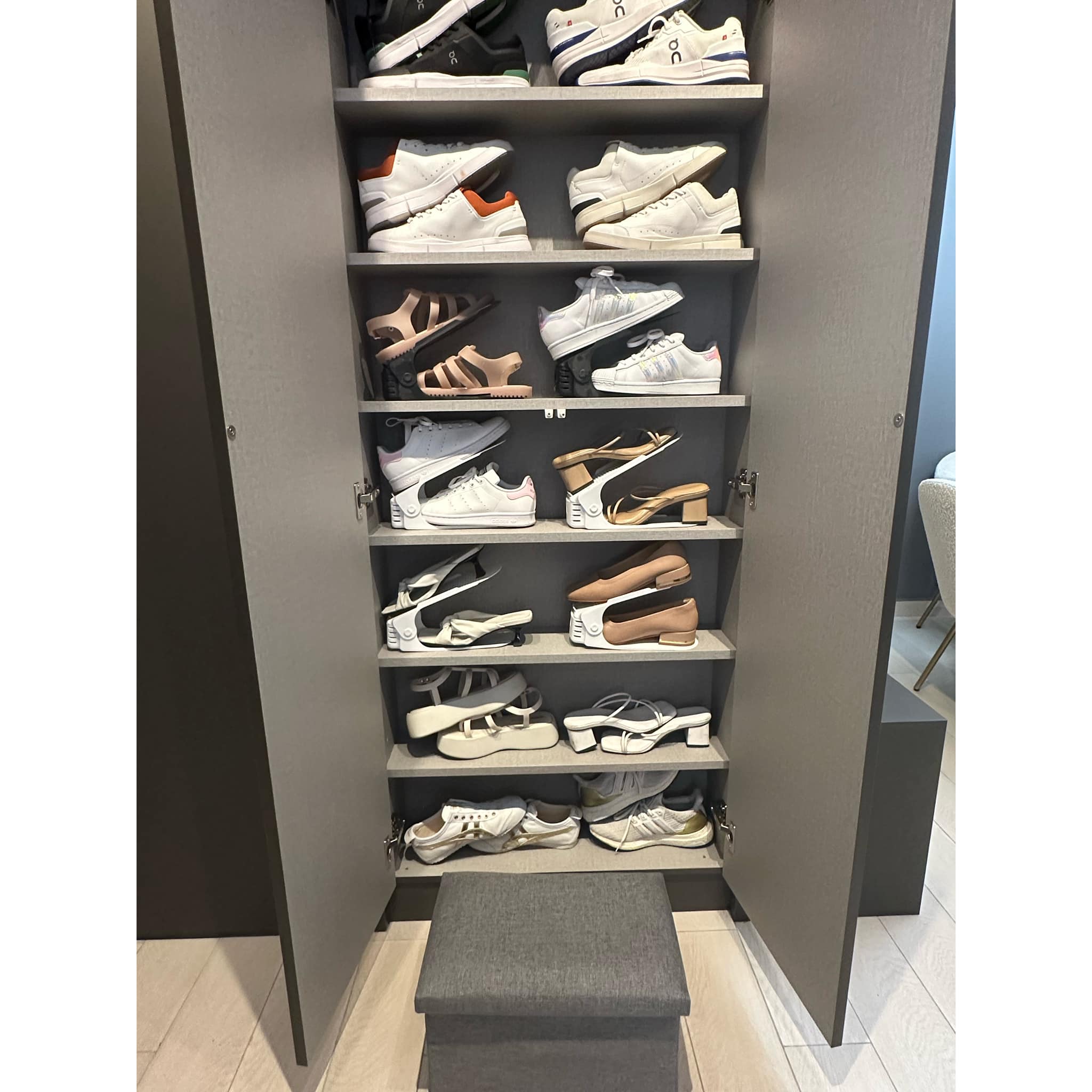A Stylish Welcome: Sleek, Spacious and Shoe-Friendly - Shoe rack with various sneakers, shoe organizer, shoe storage, shoe