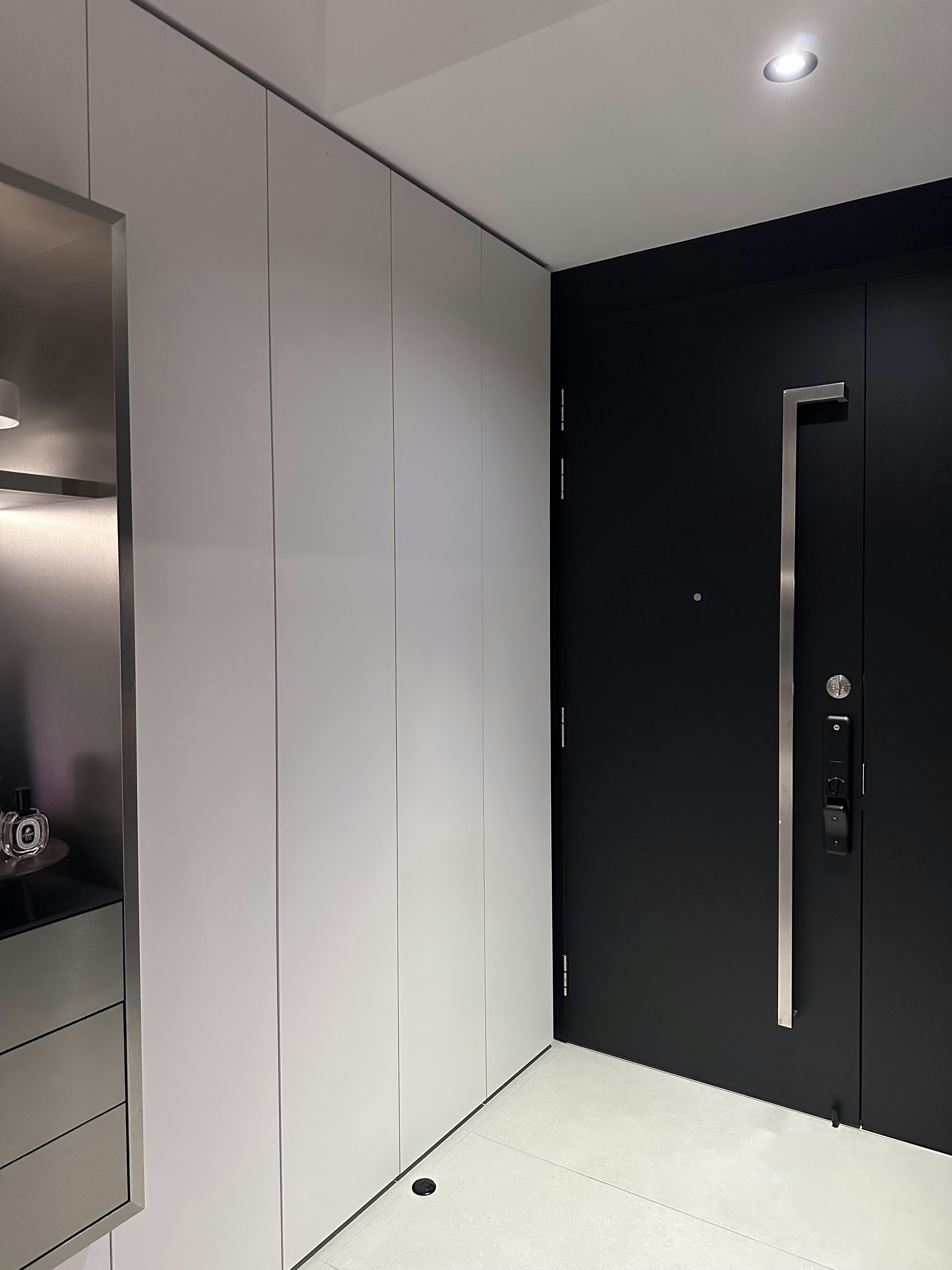 A Seamless Welcome: Introducing Our Stylish Entryway - Modern minimalist kitchen, sleek cabinets, contemporary design, black