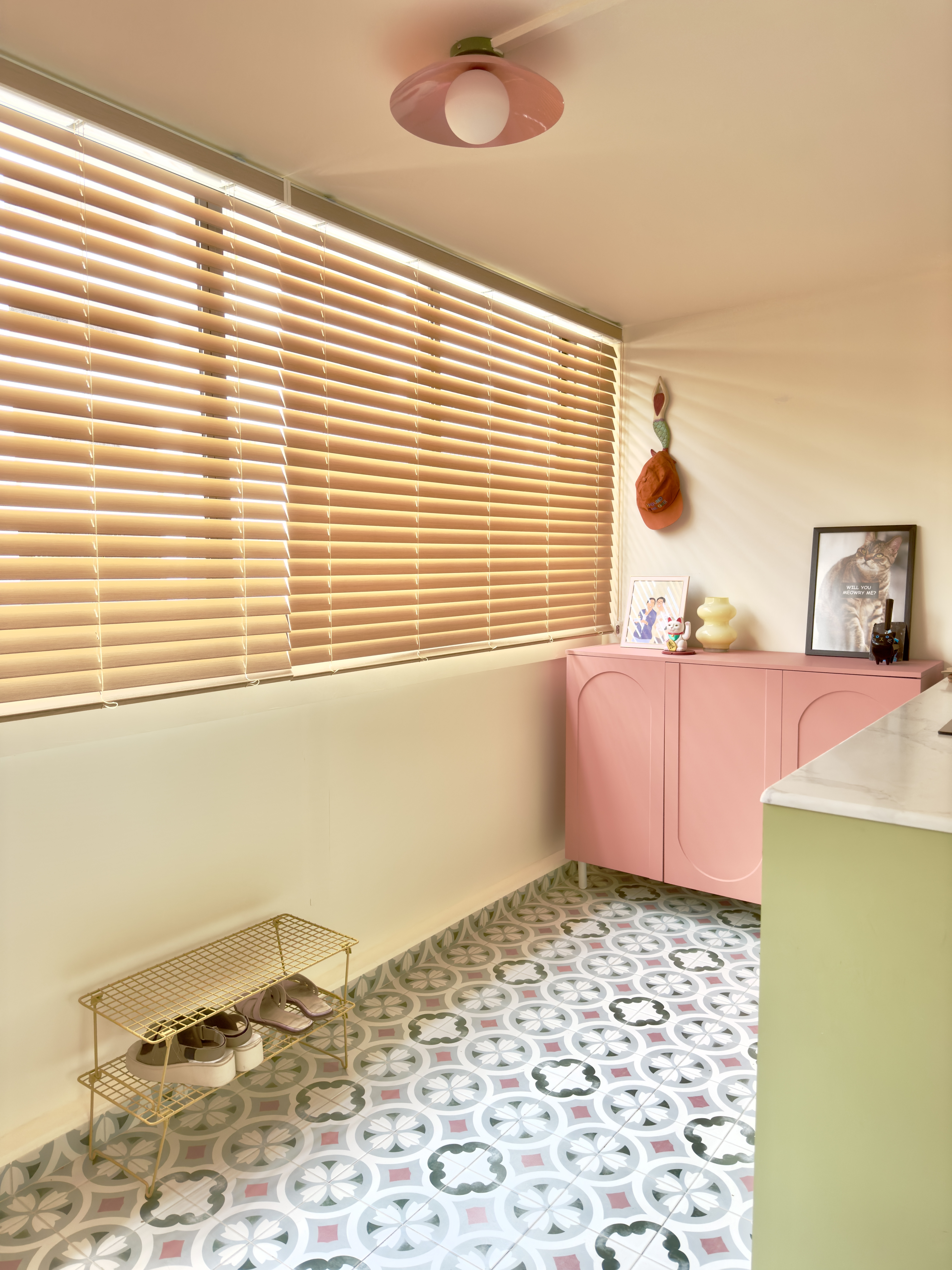 Transforming our HDB corridor into a colourful entryway - Softly illuminated by natural light filtering through horizontal