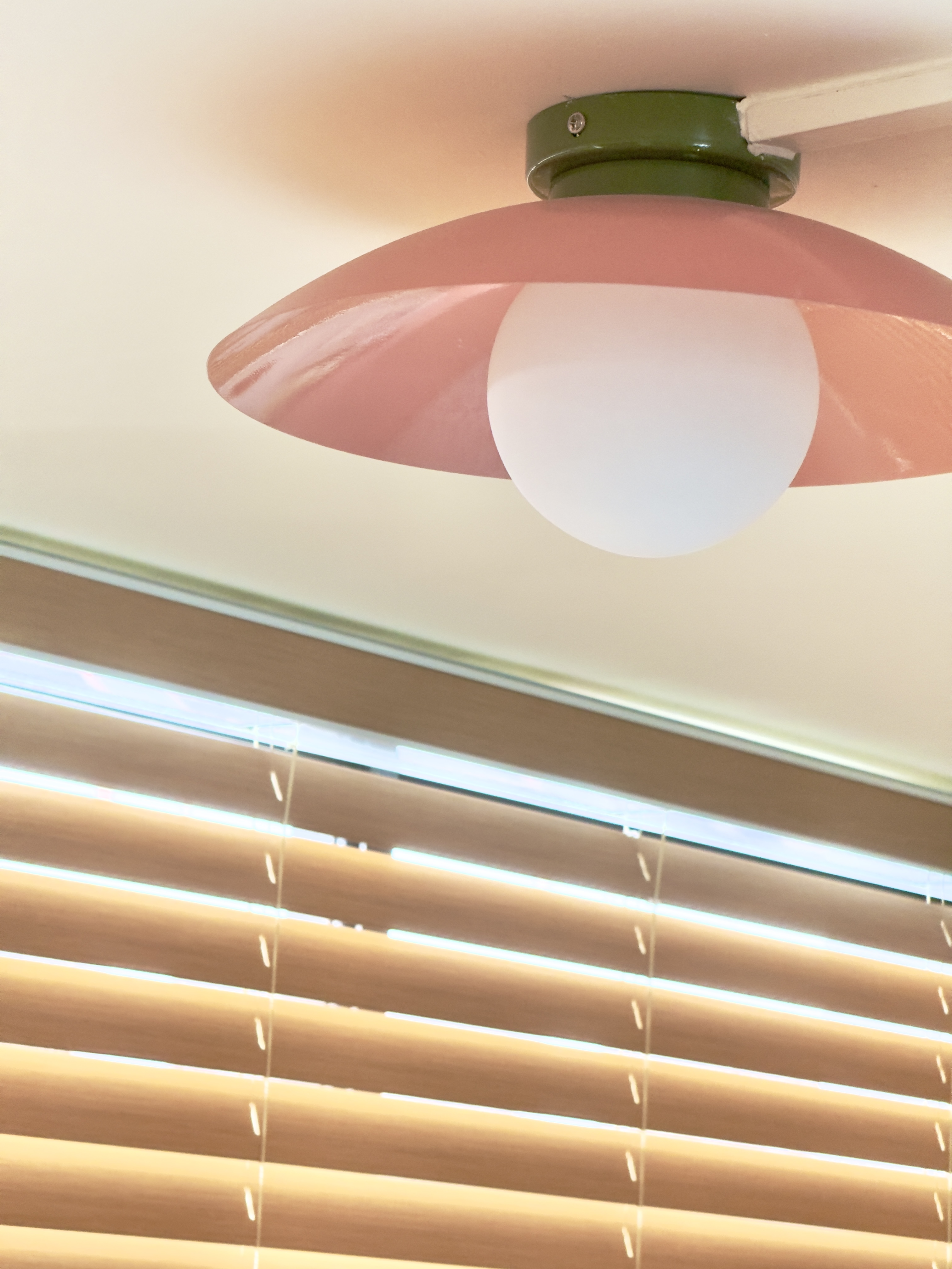 Transforming our HDB corridor into a colourful entryway - Pink ceiling light fixture, soft pink shade, white spherical light