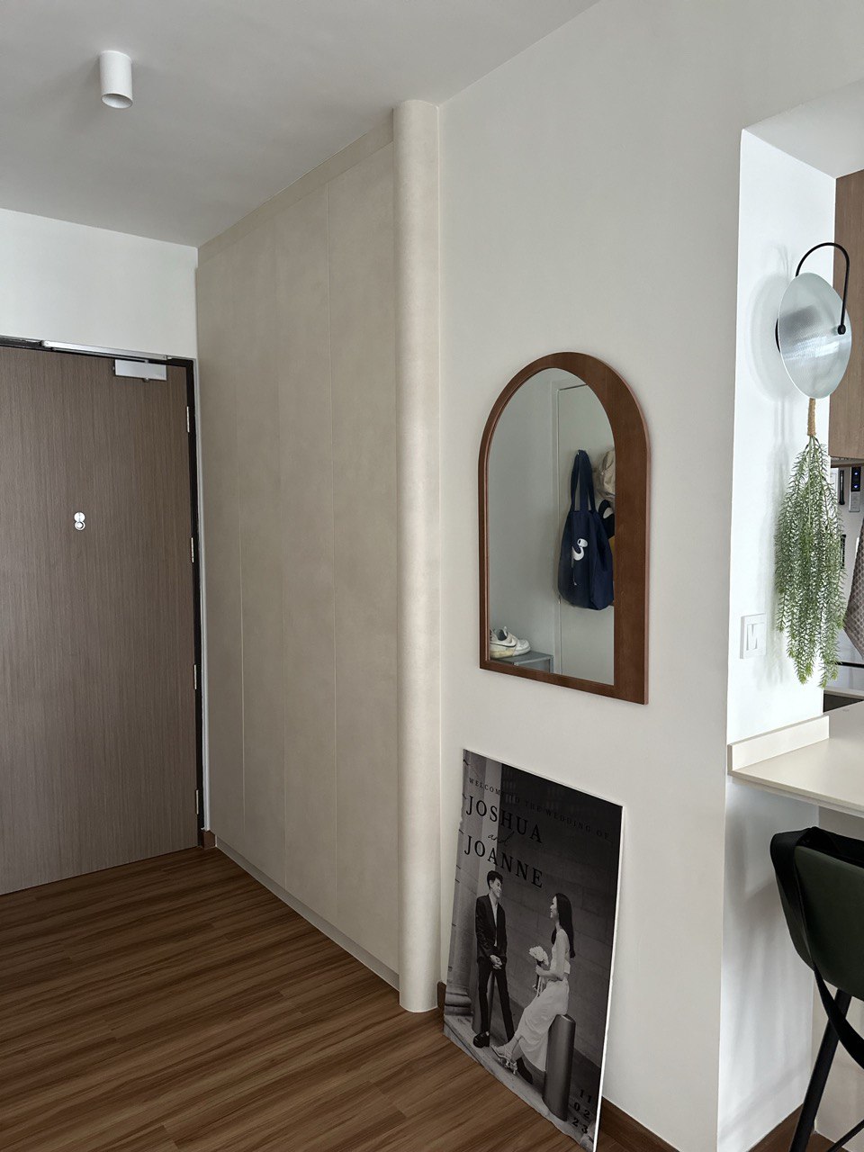 Not covering up your bomb shelter with a feature wall? No problem! - Modern minimalist interior, wooden floor, sleek