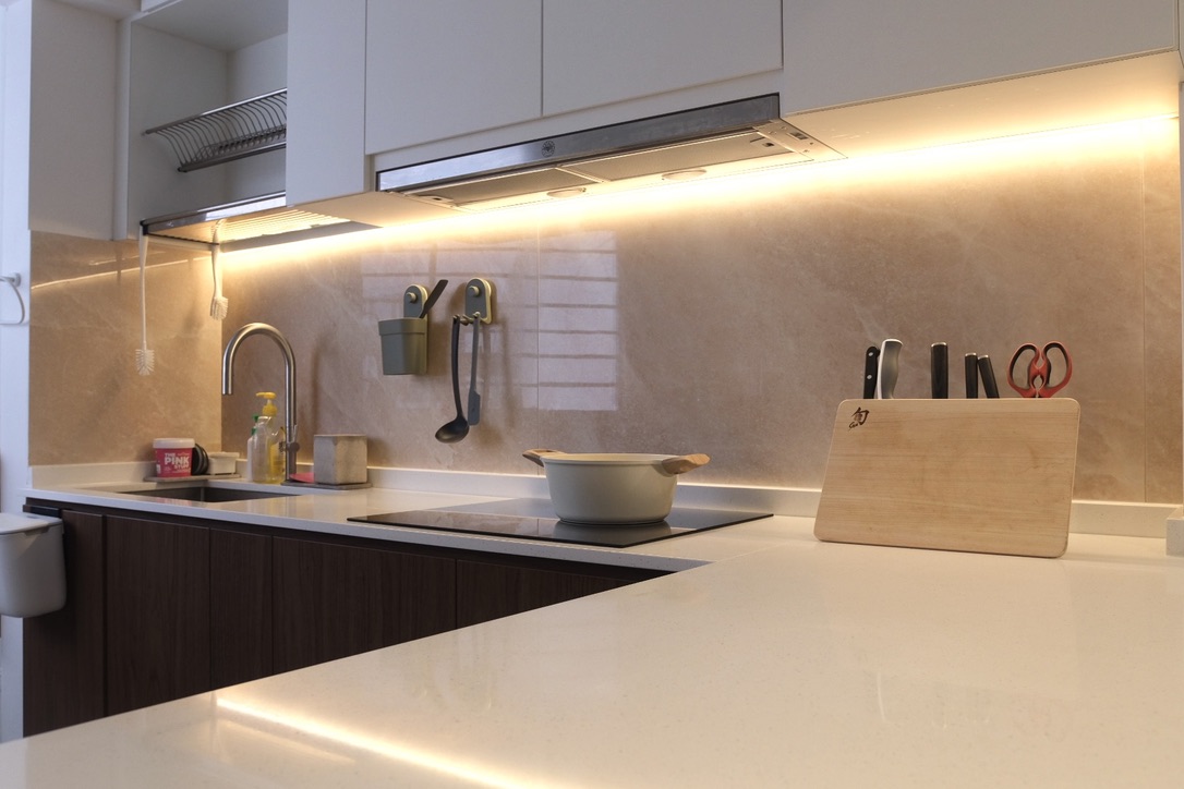Reimagining our Diagonal Kitchen into an Inviting & Functional Space - White kitchen countertop, modern sink, stainless steel