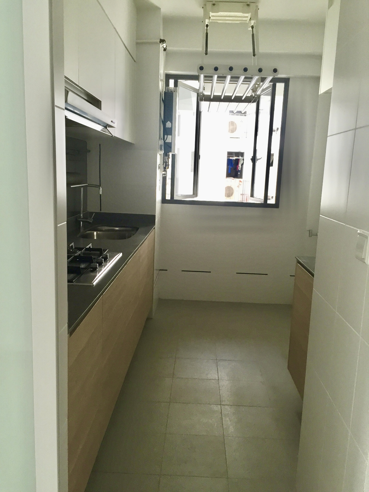 Our Standard Kitchen That Came With Our DBSS: How We Live With It - Modern kitchen with stainless steel appliances, light