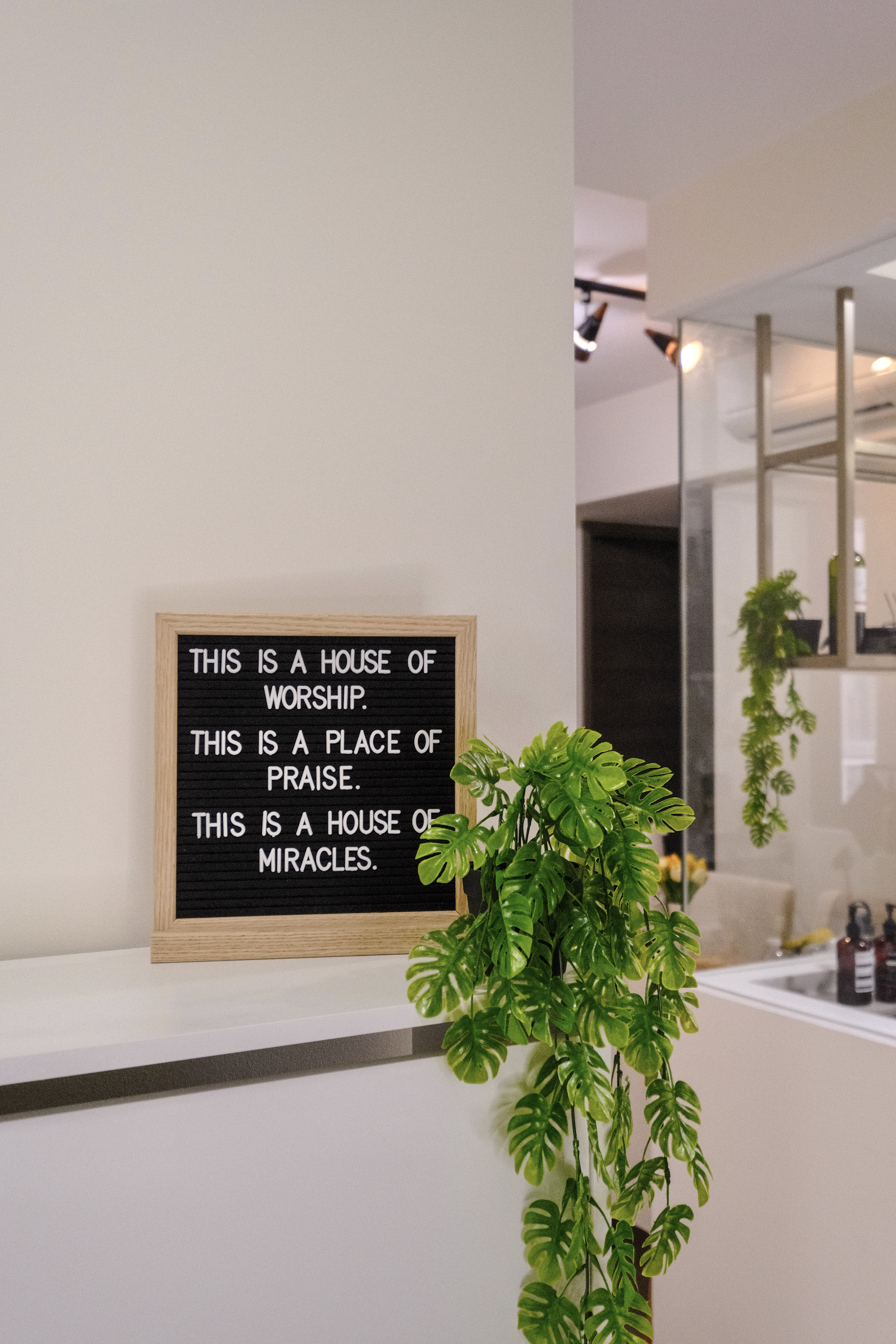Step into our minimalist entryway!  - Worship, place of praise, house of miracles, blackboard, green plants, modern interior
