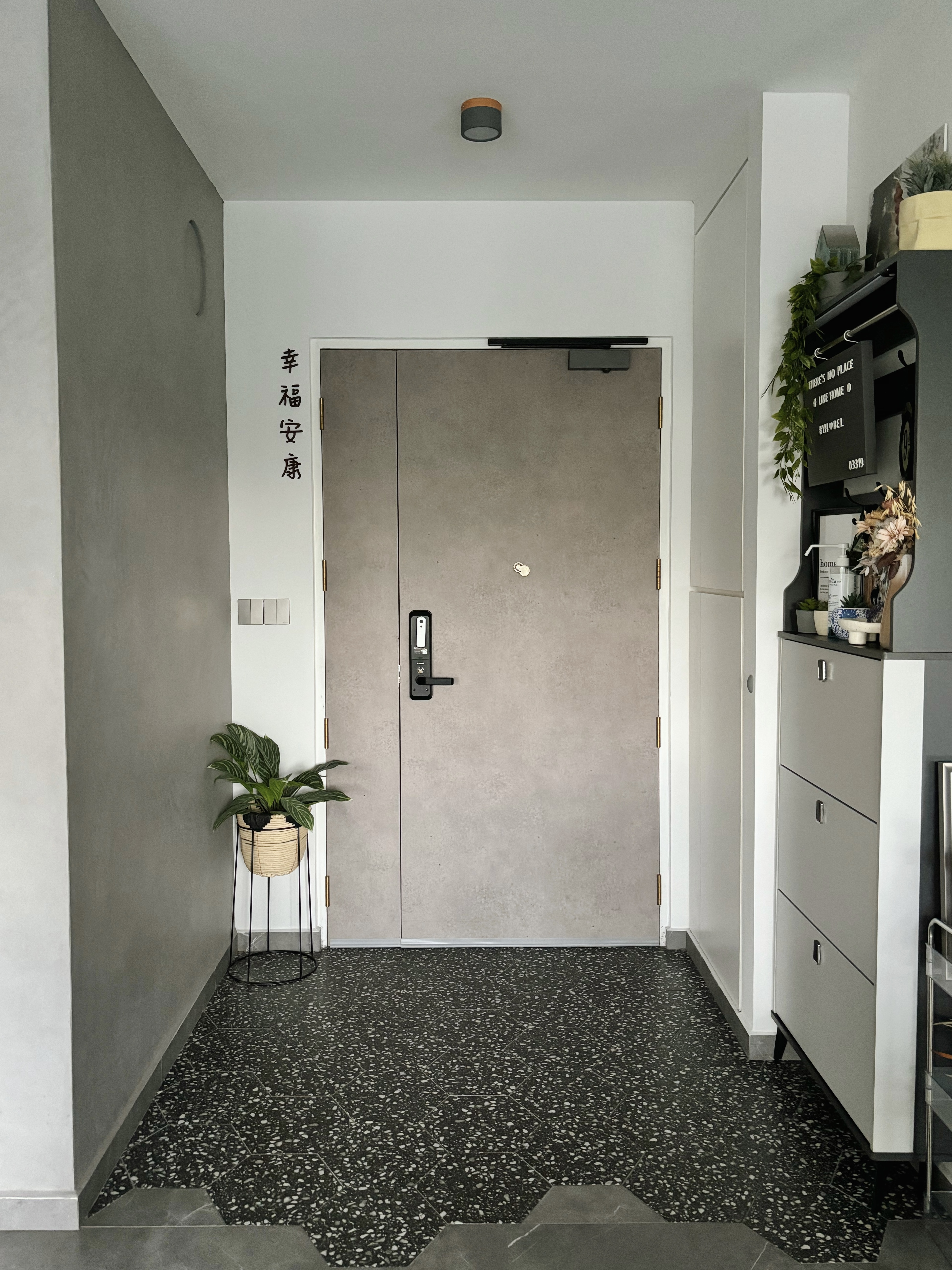 Knock Knock! Who’s There? Potterhome’s Welcoming Entryway - modern minimalist hallway, contemporary design, sleek door, gray
