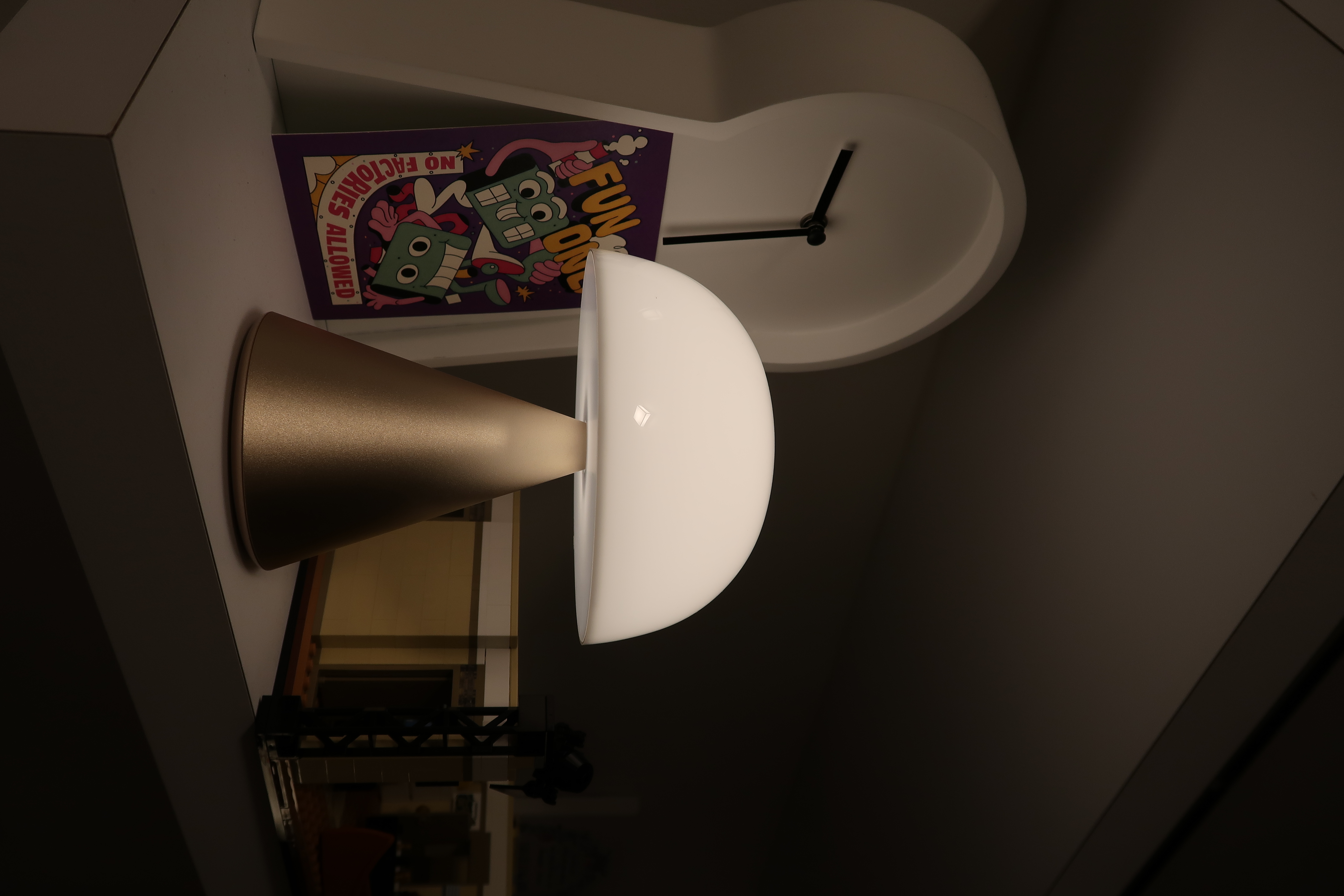 How we create a cosy ambience with accent lighting  - Sleek modern pendant light fixture, Cartoon character on wall