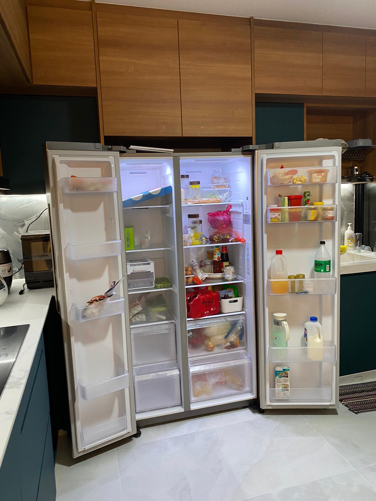 Self-designed Kitchen: how we make a small space work - Modern kitchen with open refrigerator, various food items, clear