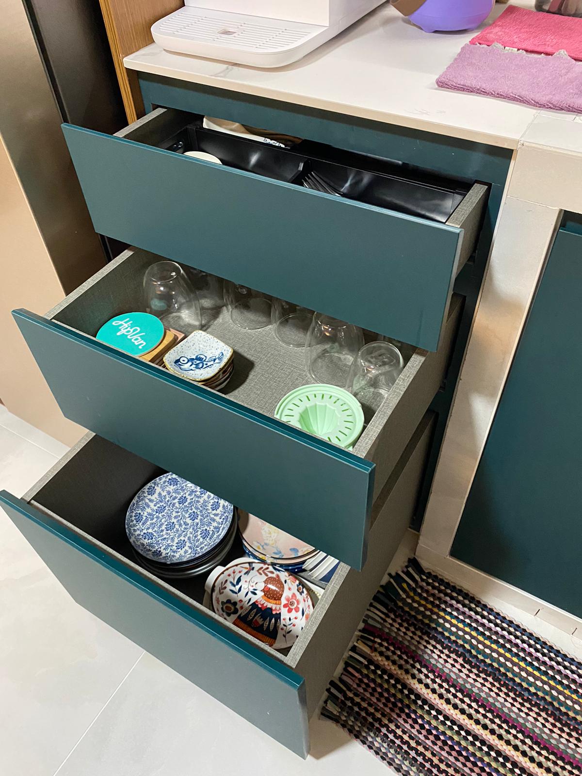 Self-designed Kitchen: how we make a small space work - Organized kitchen drawer, neatly arranged dishes, colorful plates