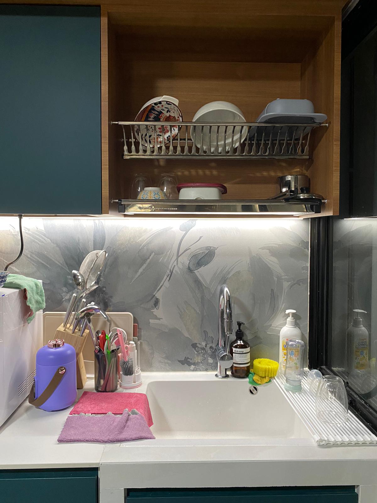Self-designed Kitchen: how we make a small space work - kitchen sink area, stainless steel faucet, white countertop, pink