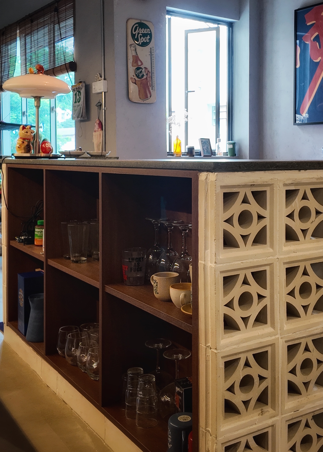 This is where food babies are made - glassware, bar counter, decorative tiles, vintage advertisement, calendar, window