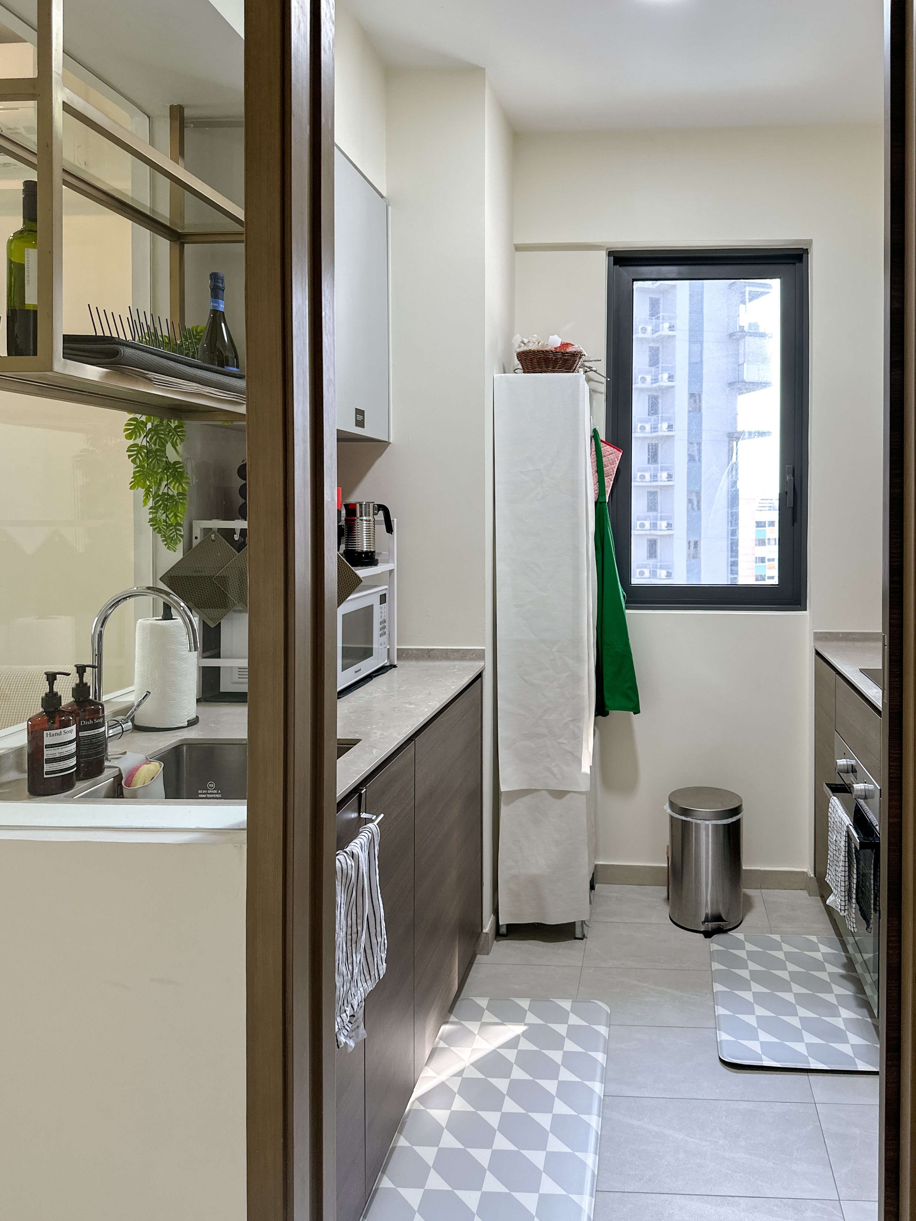 Embrace the simplicity of the kitchen! ✨ - Kitchen cabinetry, modern design, stainless steel sink, white countertop, green