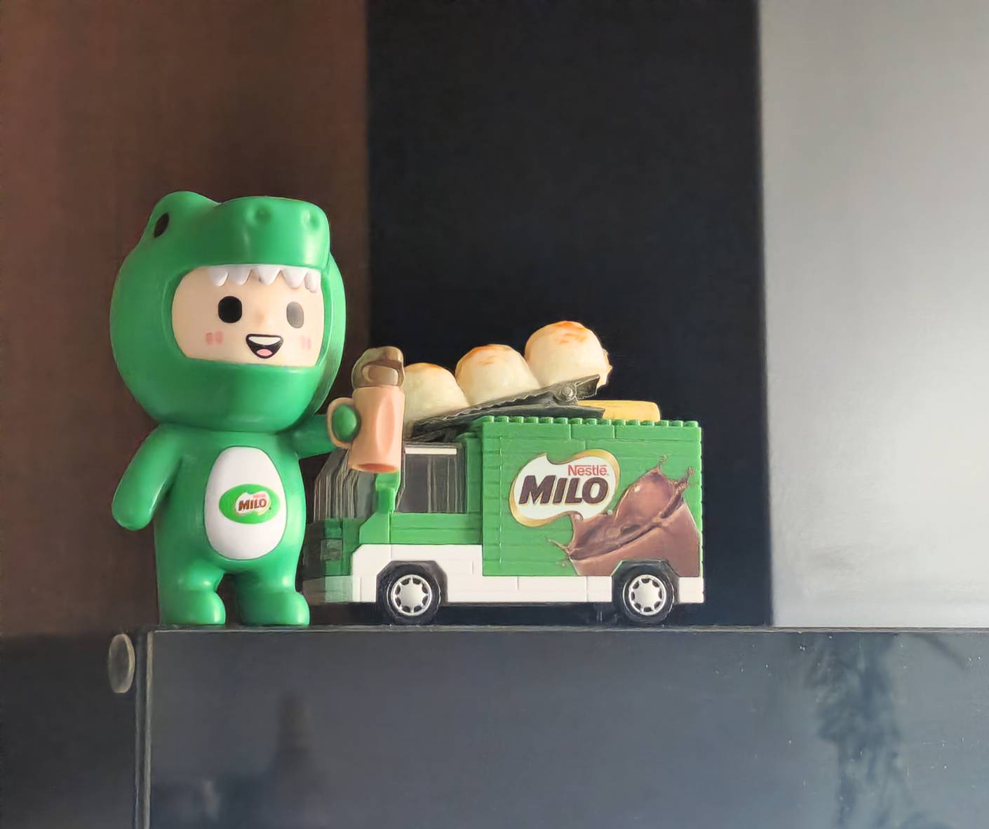 Reimagining Our Kitchen: A Year of Transformation and Our Best Tips - Green frog toy, Hello Kitty-themed figure, brown and