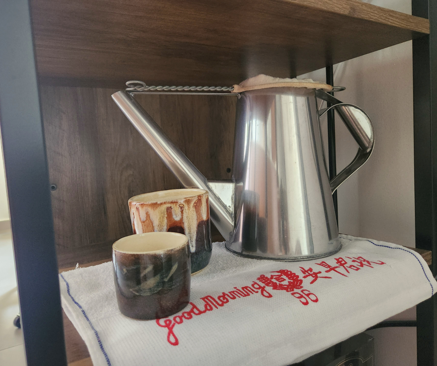 Reimagining Our Kitchen: A Year of Transformation and Our Best Tips - mug, coffee pot, wooden shelf, metal handle, white