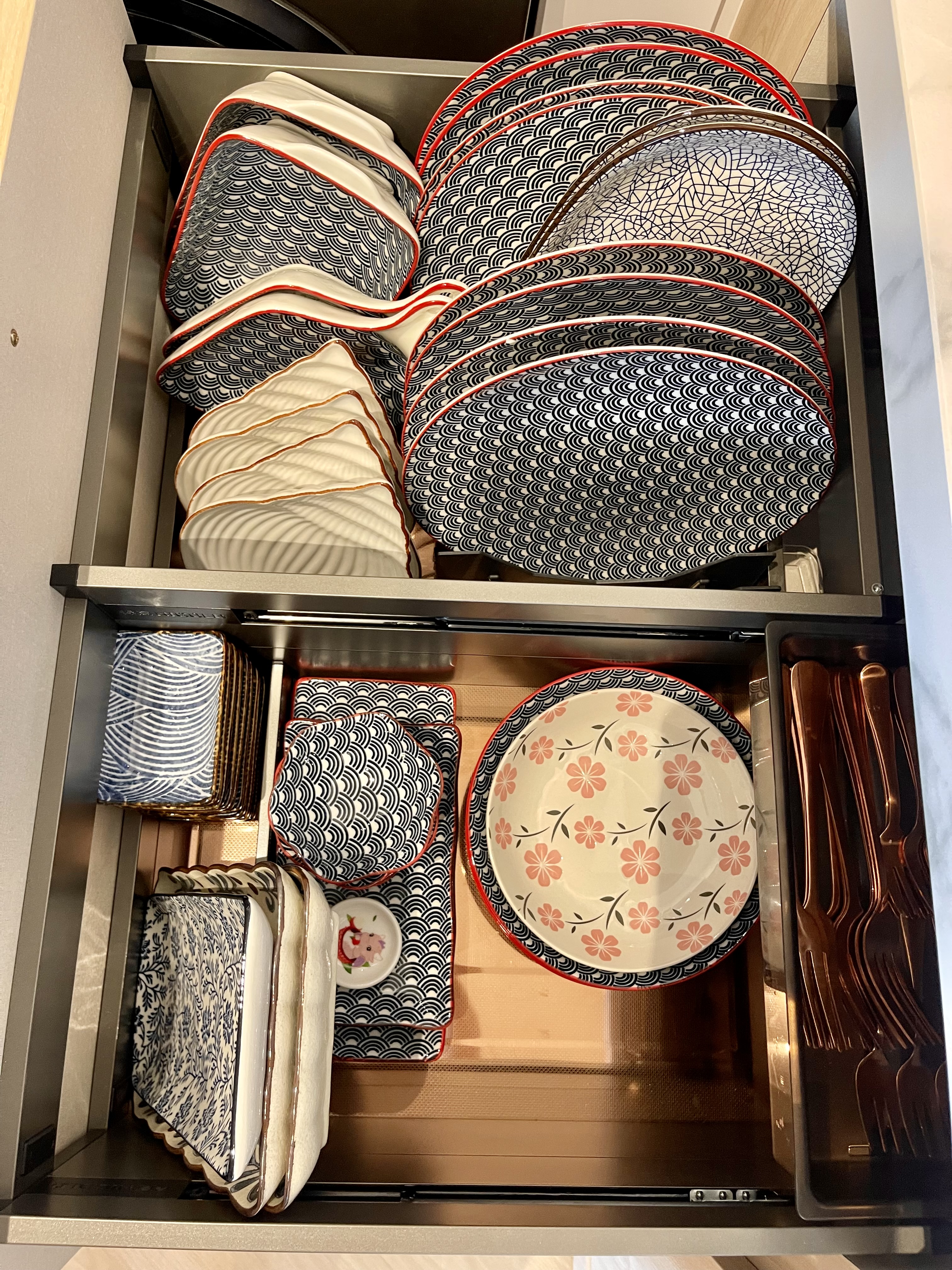 Our Kitchen: A Fusion of Muji Concept & European Shaker-Style Cabinets - Japanese-style plates with intricate patterns
